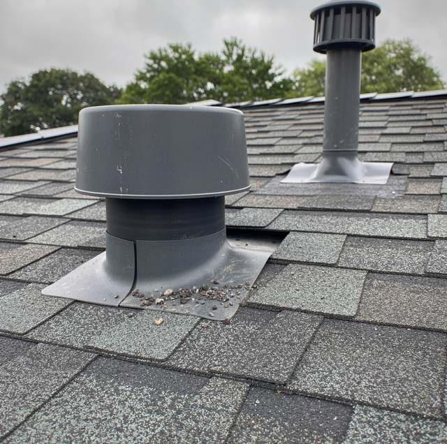 Cracked rubber pipe boot on shingle roof