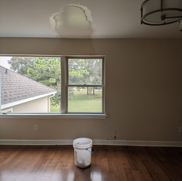 storm damaged shingle roof on Louisiana house