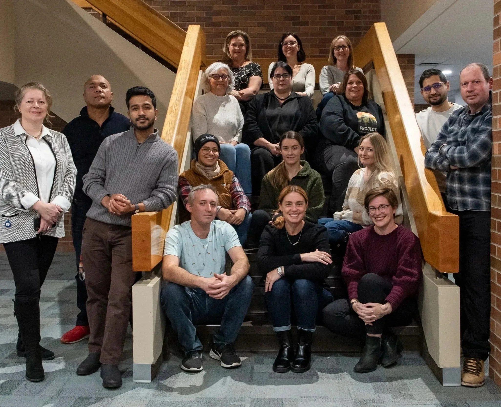 Small group of entrepreneurs gathered for an interactive business education workshop focused on collaboration, discussion, and practical learning.
