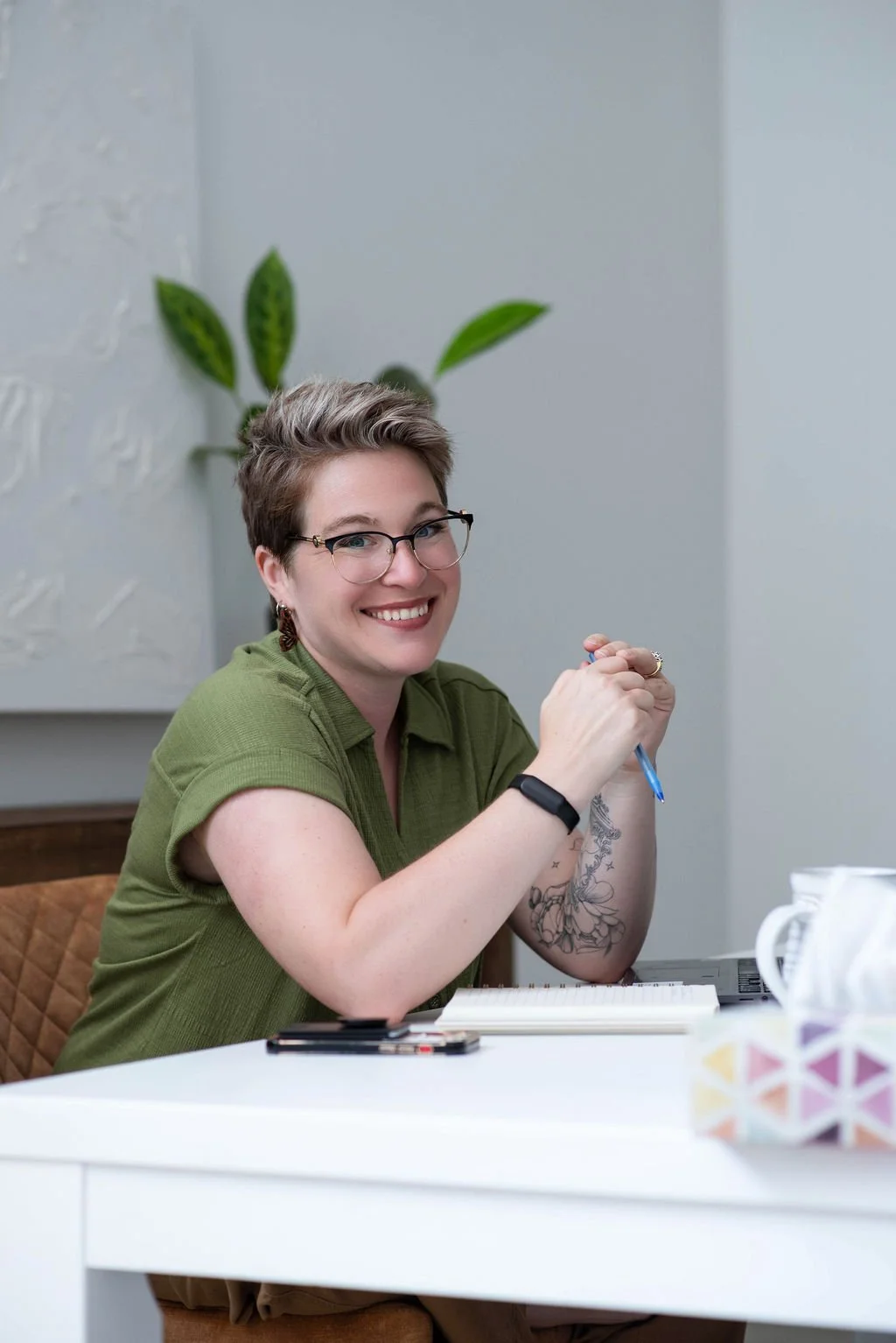 Business coach welcoming an entrepreneur into a practical business coaching conversation.