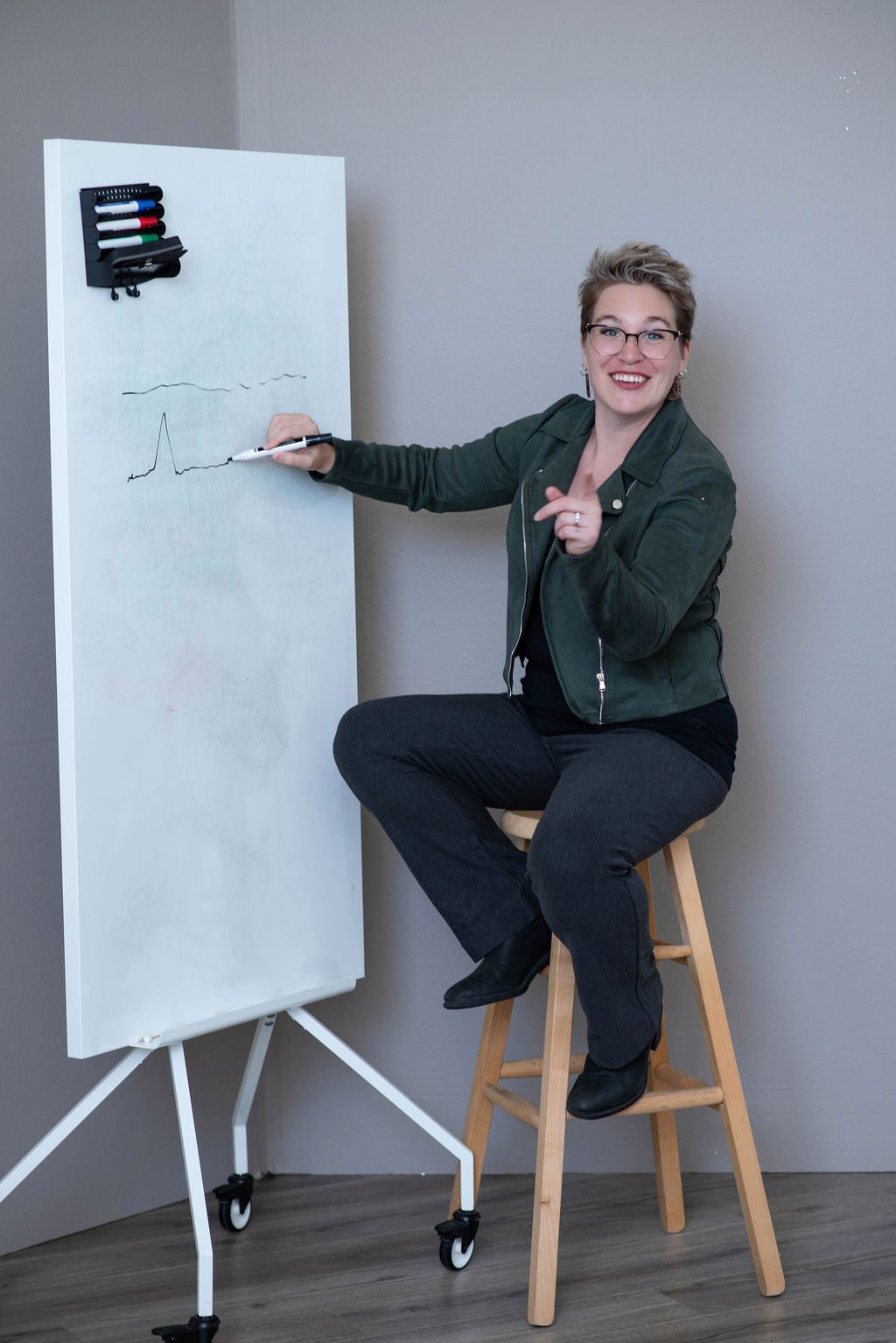 Business coach teaching practical business planning during a live class