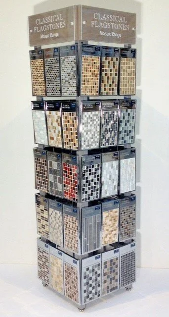 Tile display rack showcasing an assortment of mosaic tiles in various colors and patterns, labeled 'Classical Flagstones Mosaic Range.'