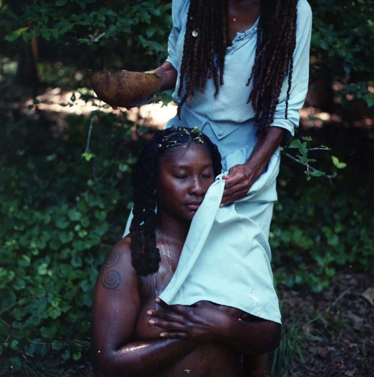 ina covered by elder.jpg
