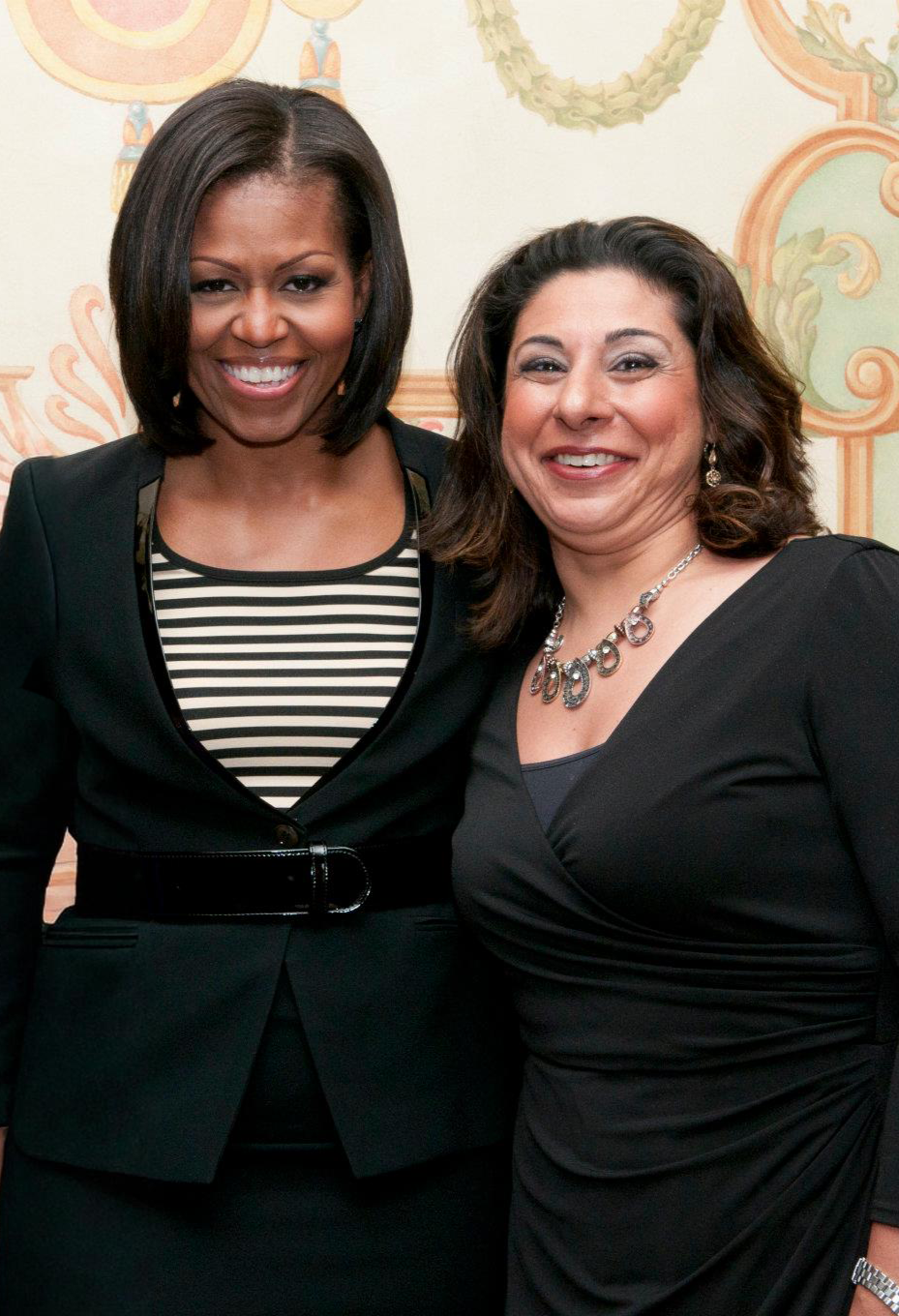 Dolly Chugh with formere First Lady Michelle Obama