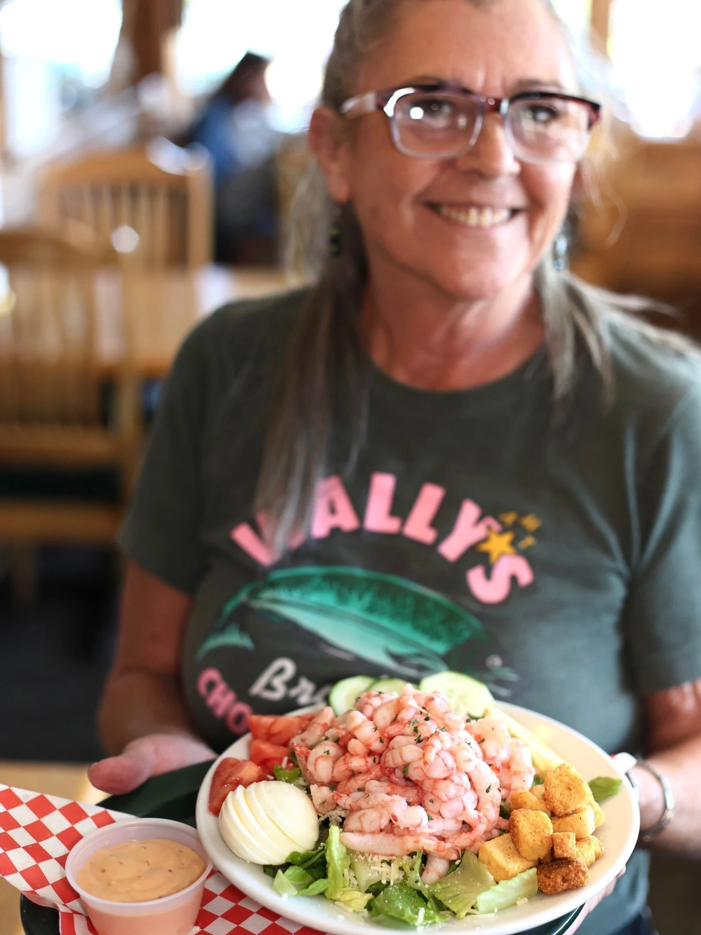 If seafood's calling your name today, we know just the plate!

Come to Wally's and try our Shrimp Salad - A beautiful stack of fresh baby shrimp with tomatoes, cucumbers, croutons, eggs and parmesan loaded atop a bed of lettuce and served with your c