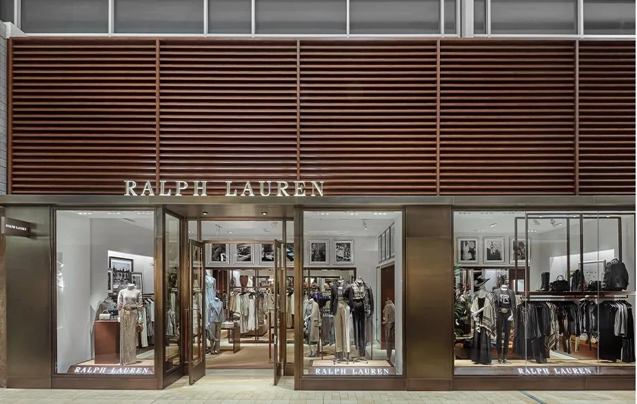 American luxury lifestyle brand storefront featuring custom timber exterior millwork and architectural entry by Charrette Management Group