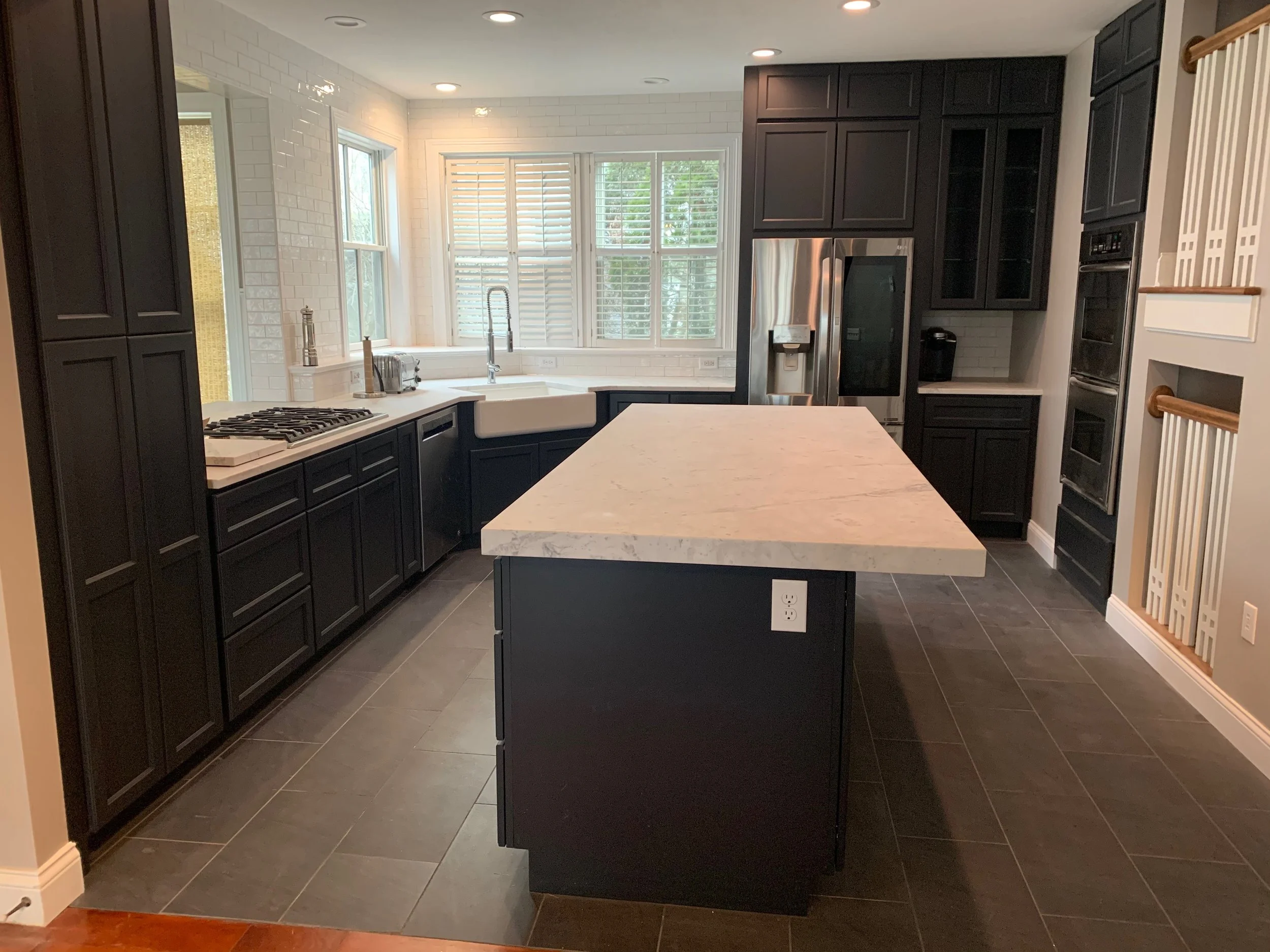 Modern luxury kitchen remodel with custom cabinetry, quartz countertops, and premium finishes in Lakewood Ranch Florida