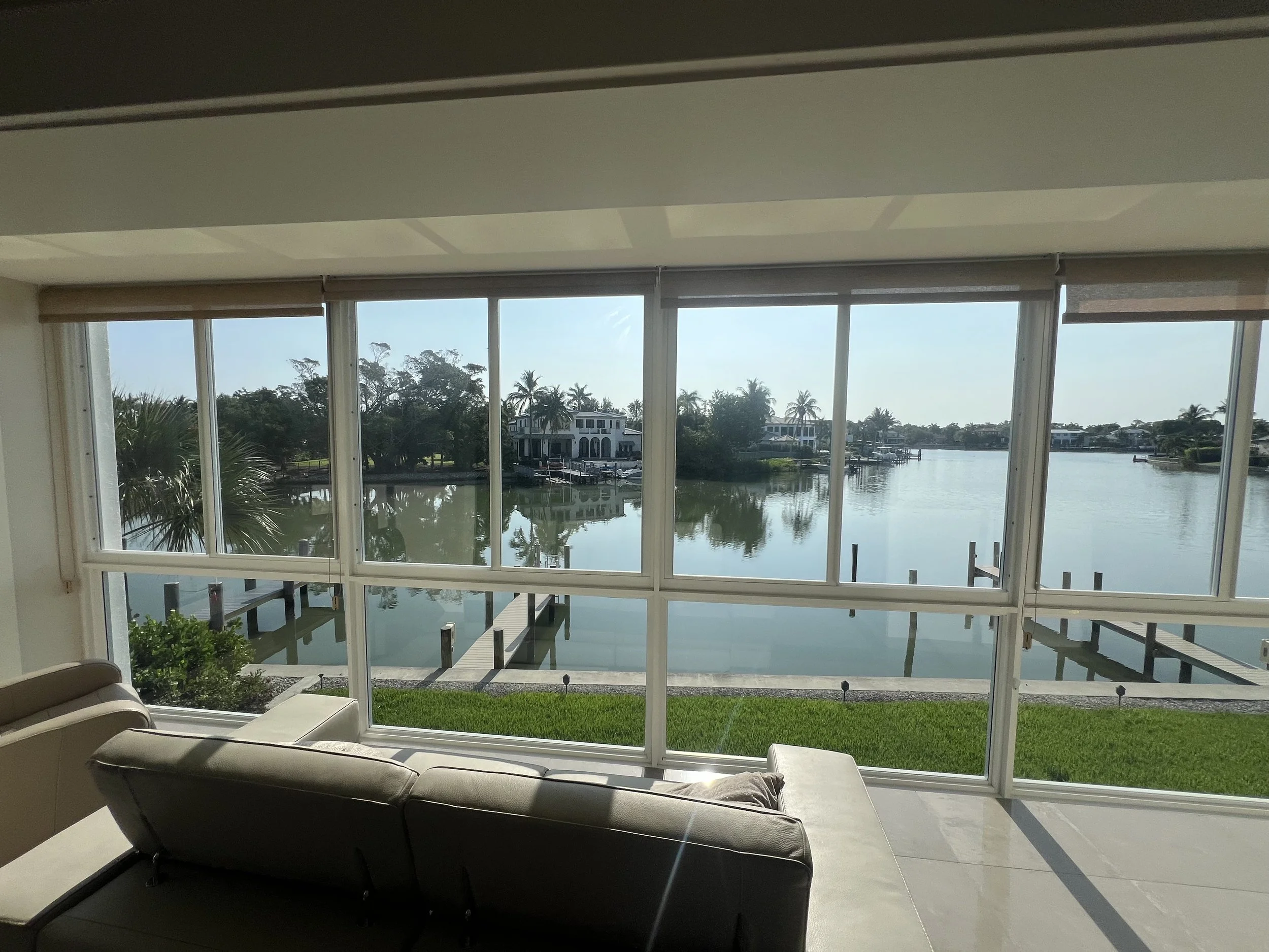 Waterfront home with floor to ceiling windows overlooking the intracoastal waterway in Southwest Florida