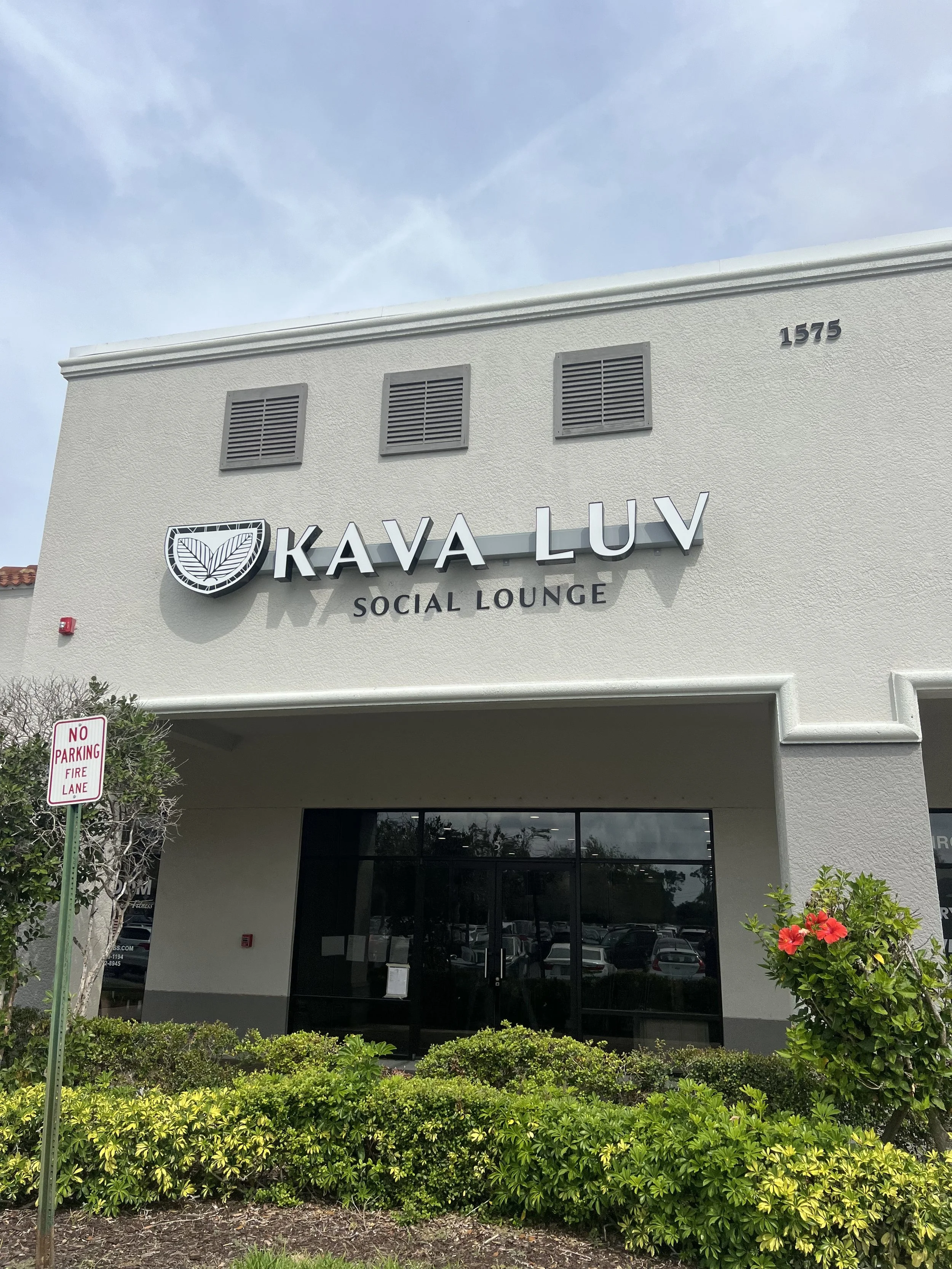 Modern commercial building construction with custom storefront and exterior finishes in Estero Florida