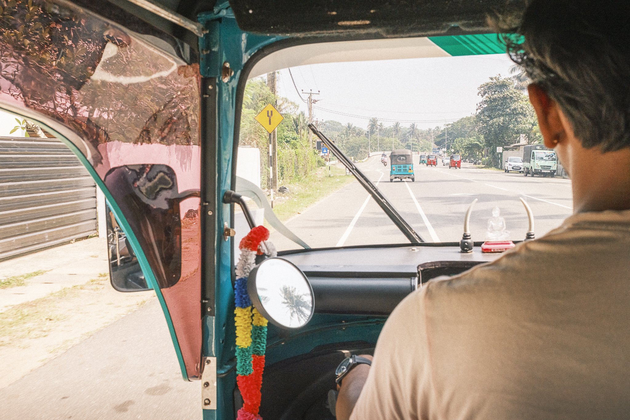 This picture shows a tuk-tuk driver in Sri Lanka on the south coast