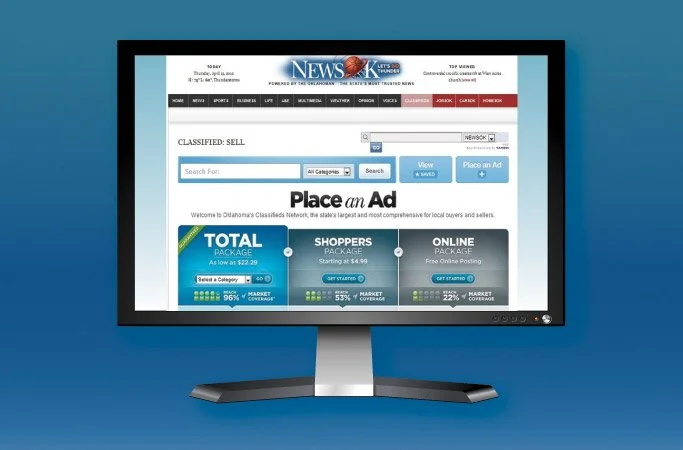 Computer monitor displaying an online classified ads website with search options and category listings for selling items in Oklahoma.