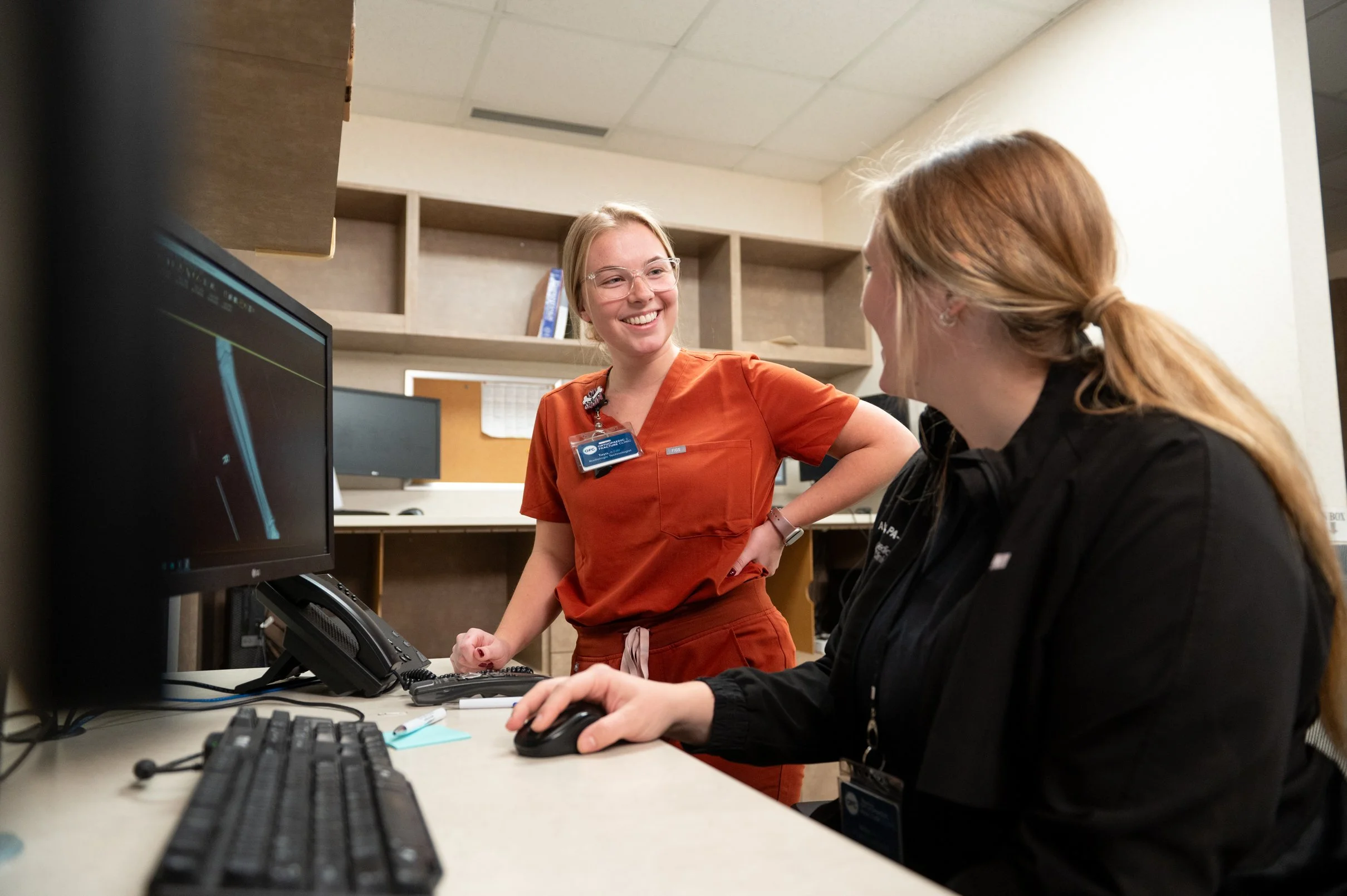 ofc employees smiling in the office