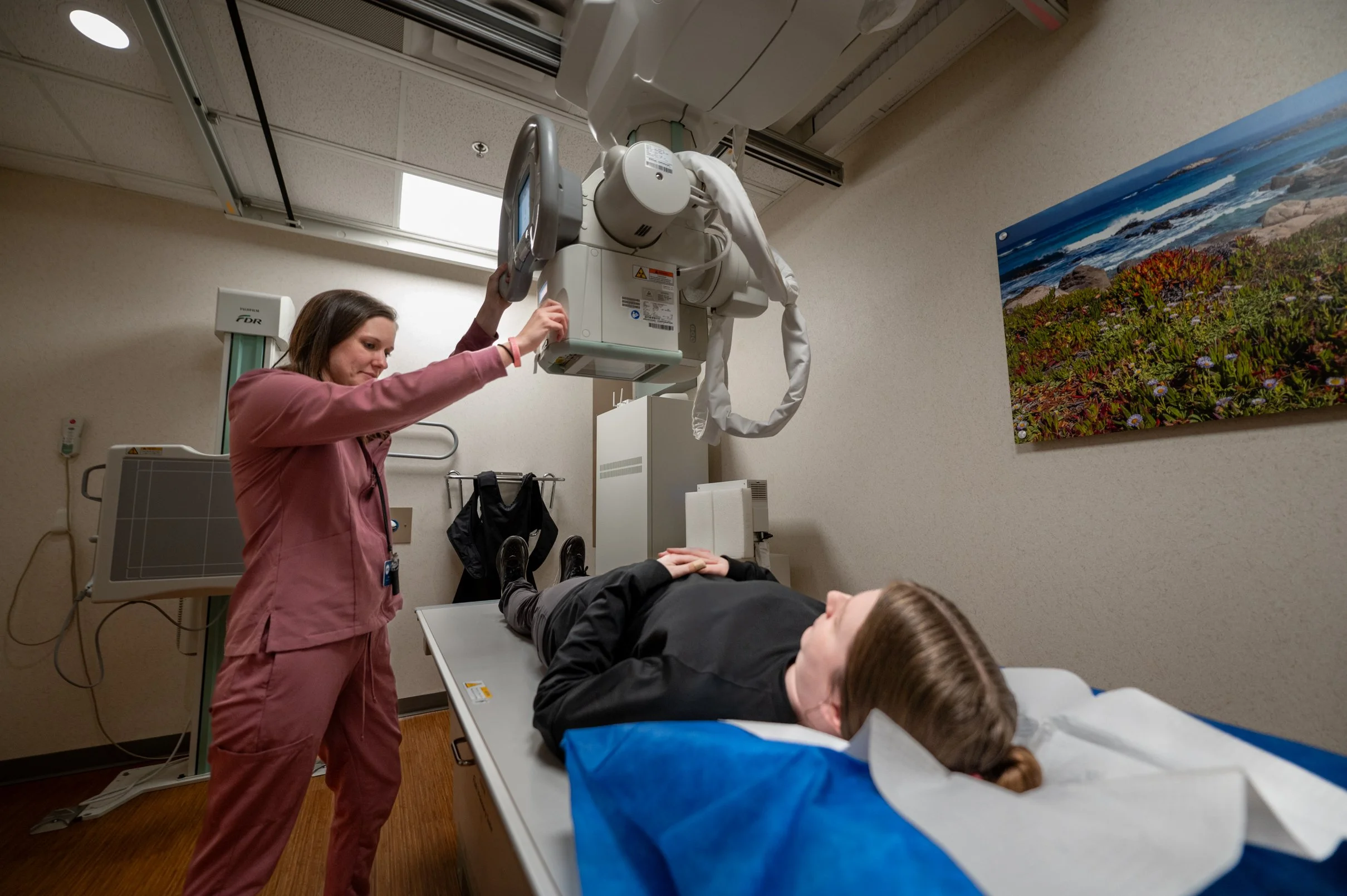 ofc employee using xray machine