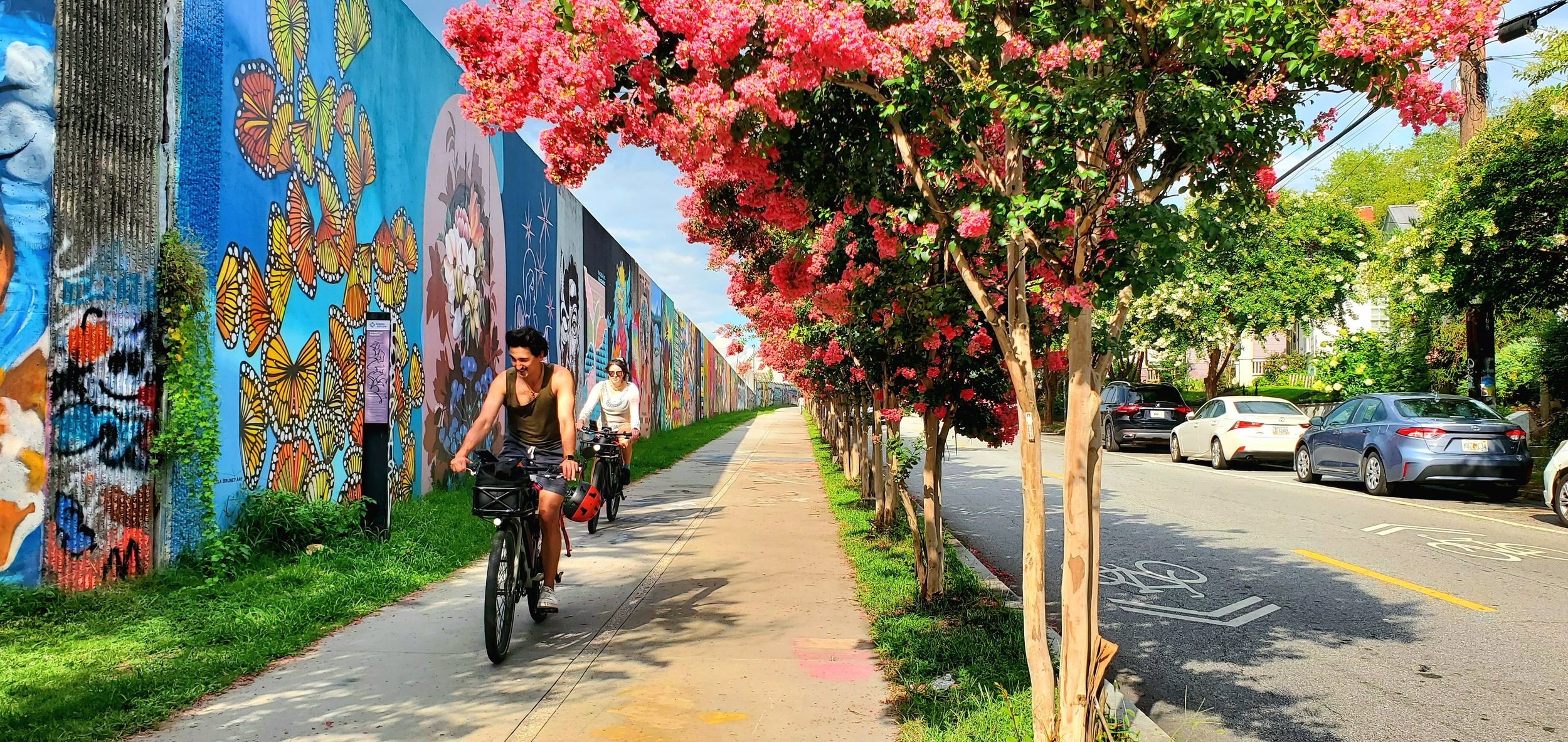 Cyclists riding along Atlanta BeltLine Eastside Trail near BeltLine Studio ATL