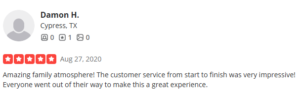 Customer review with five-star rating for a family atmosphere and excellent service, posted in Cypress, TX.