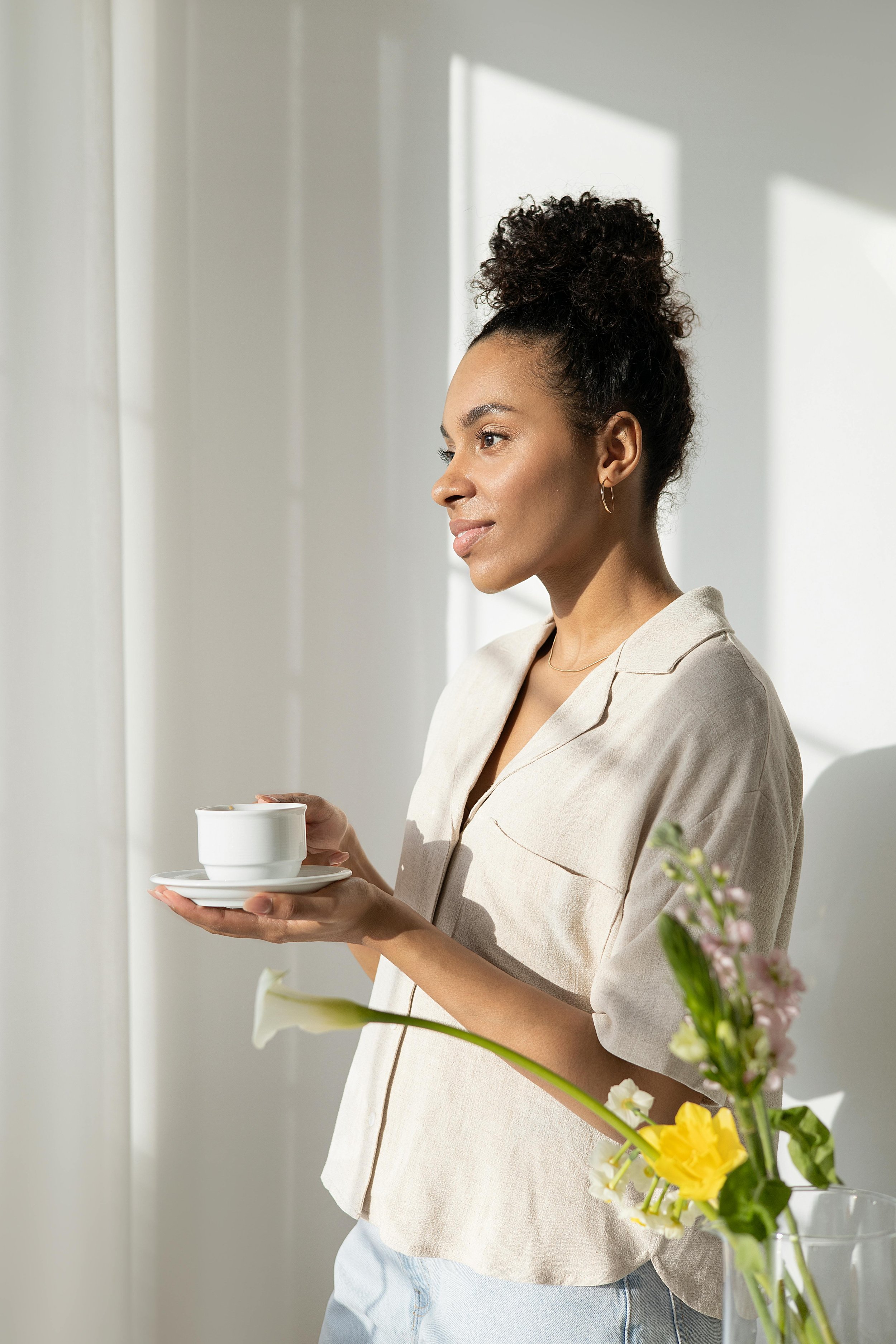 Woman feeling calm and confident after creating personalized systems and routines.