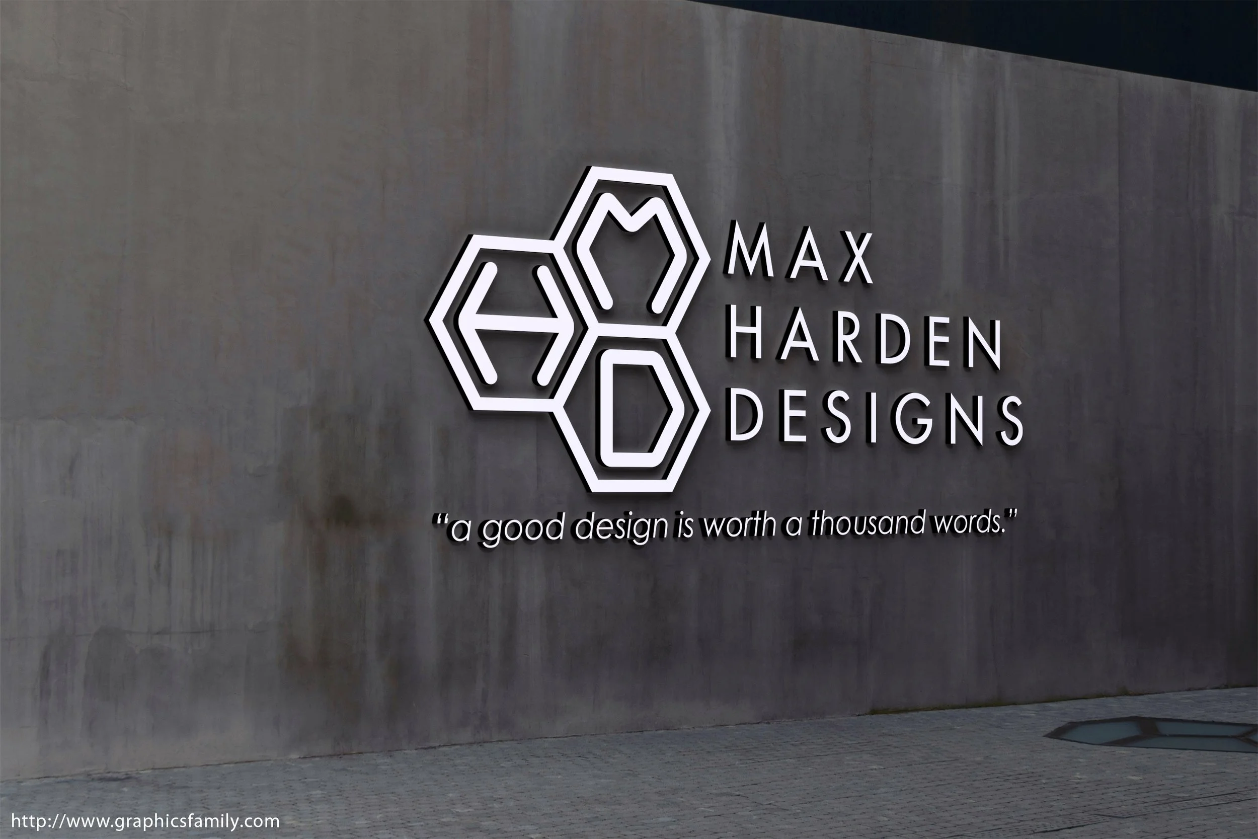 Neon sign on a gray wall reads 'MAX HARDEN DESIGNS' with a hexagonal logo and a quote below that says 'a good design is worth a thousand words.'