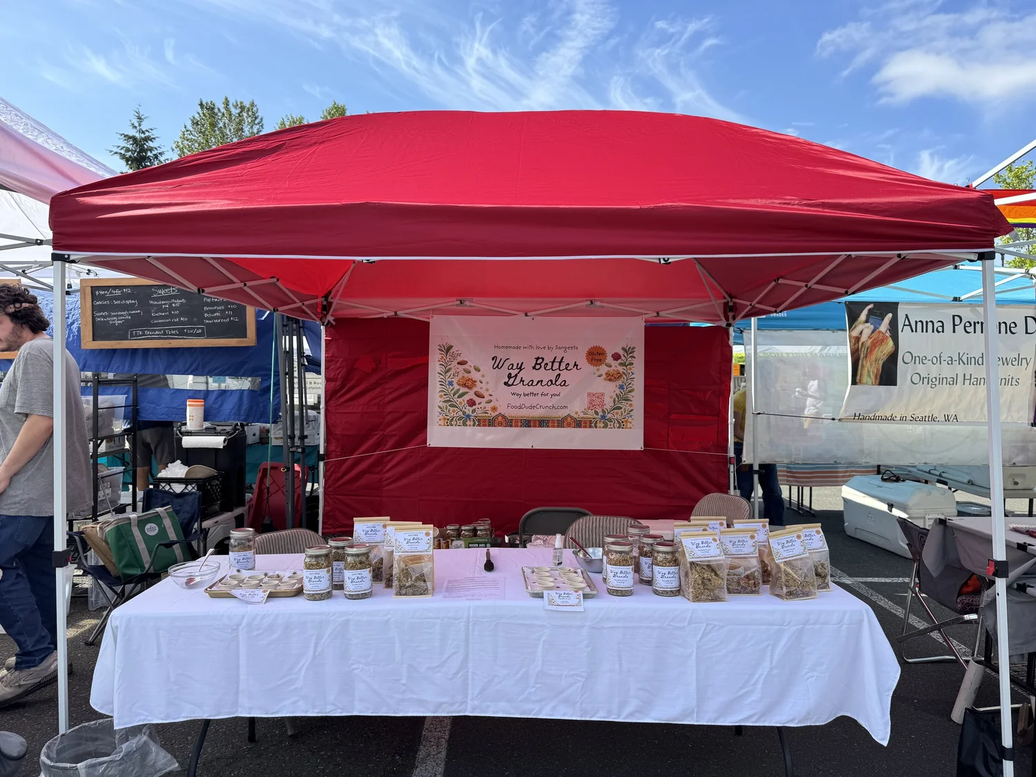 The Way Better Granola booth at a Seattle farmers market