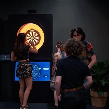 Playing the High Striker dart game