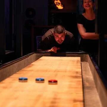Playing shuffleboard