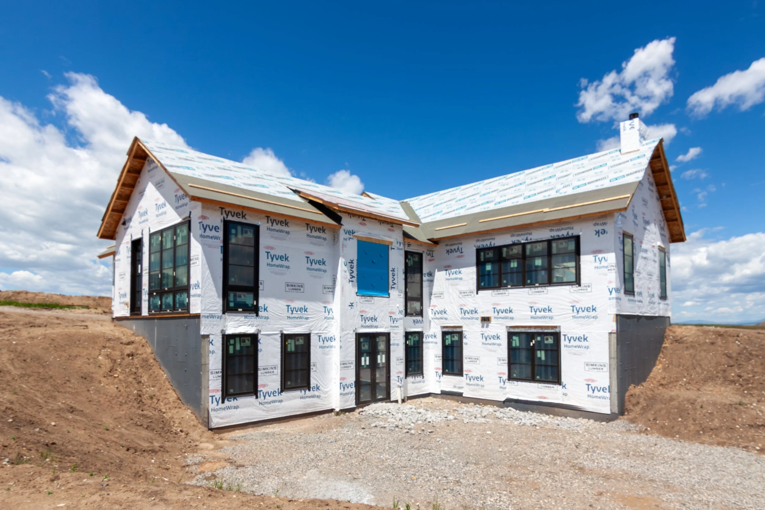A sprawling 5,500-sf residence in southeast Bozeman. Vaulted Great and Dining Rooms provide stunning views of the Bridger Mountains.