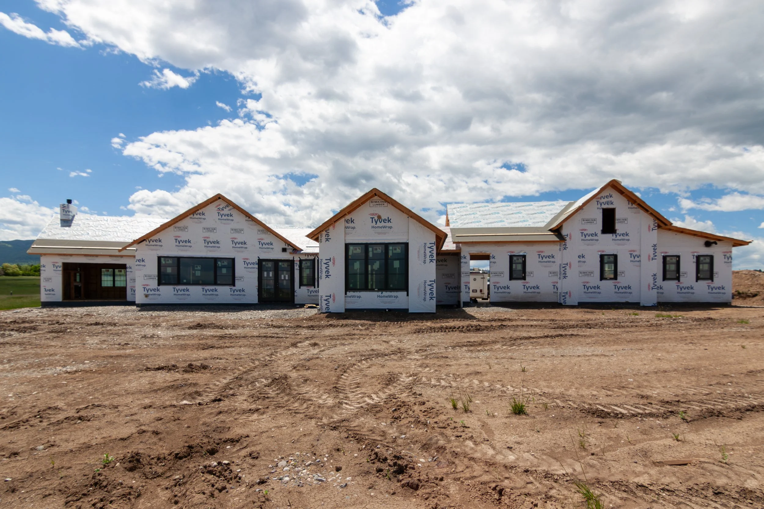A sprawling 5,500-sf residence in southeast Bozeman. Vaulted Great and Dining Rooms provide stunning views of the Bridger Mountains.