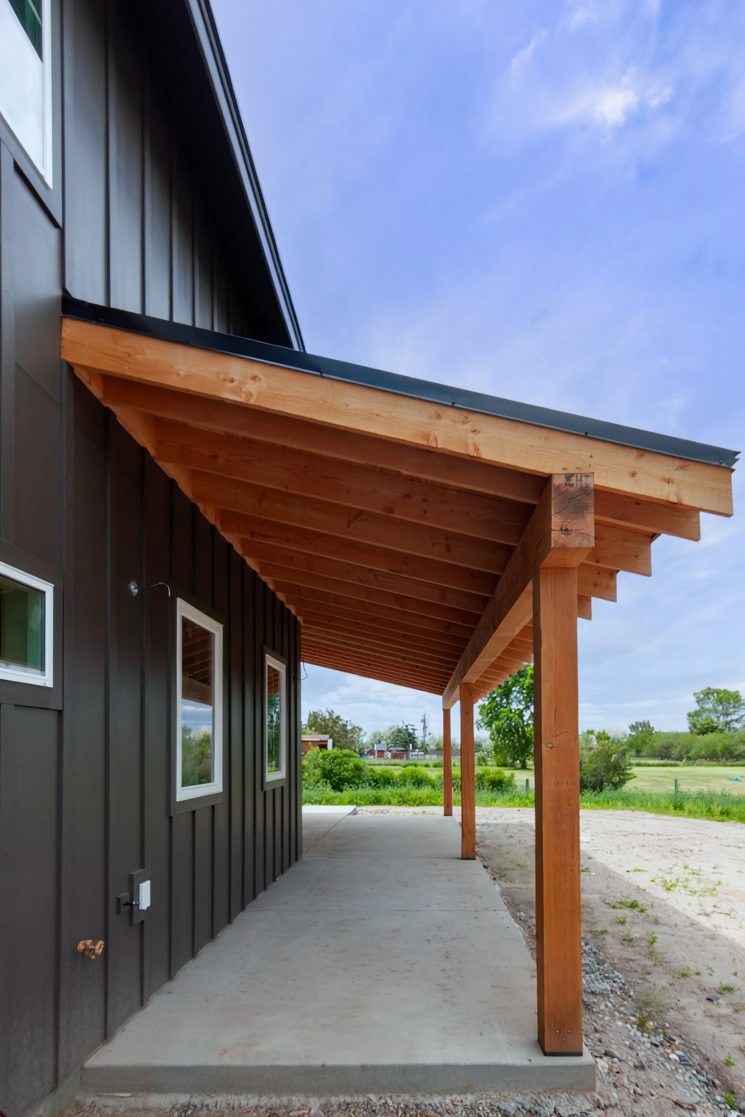 A 2-story, 3,500-sf residence with vaulted Living Room and Upper Level Loft in addition to a Gym and Office area above the Garage just north of Bozeman.