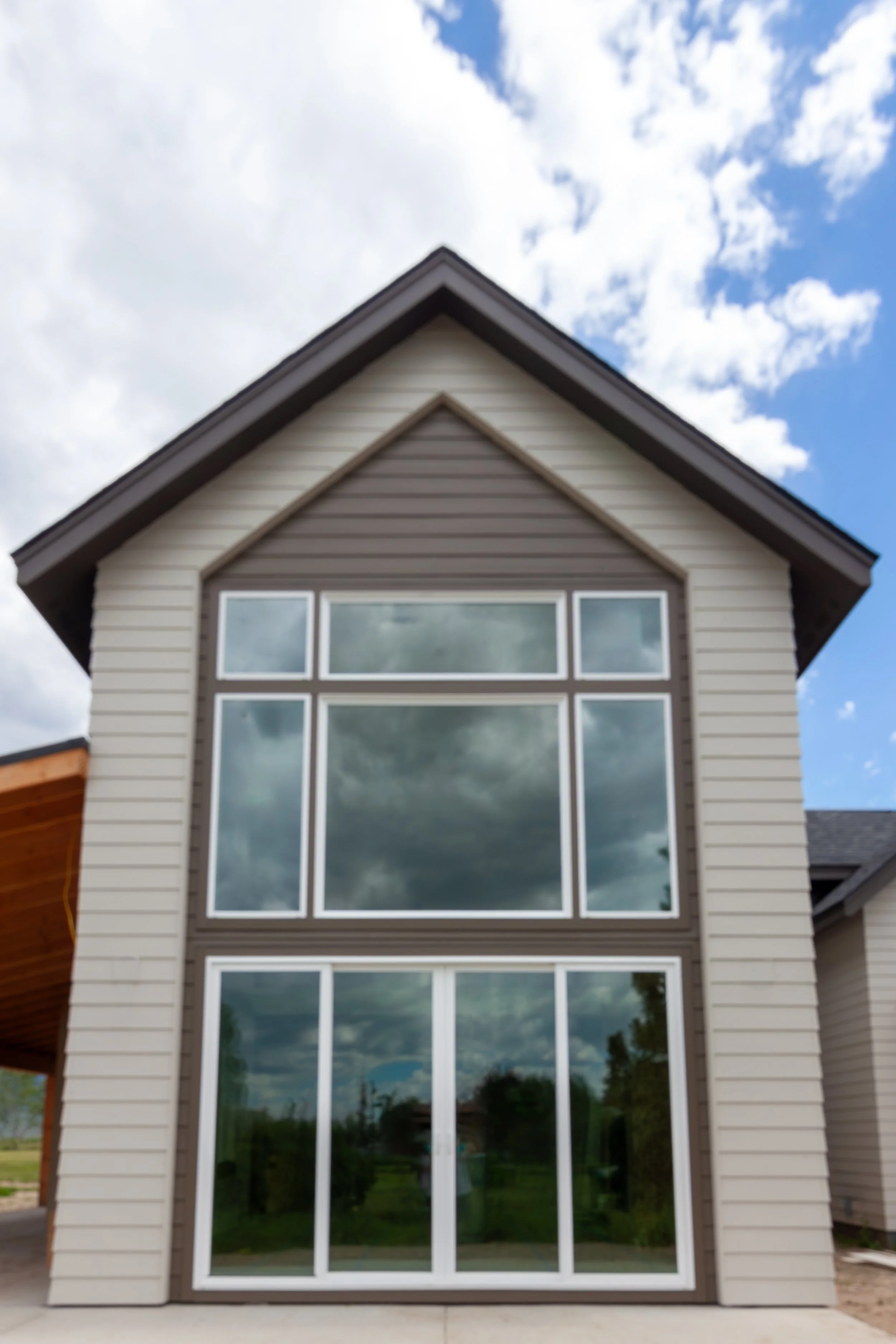 A 2-story, 3,500-sf residence with vaulted Living Room and Upper Level Loft in addition to a Gym and Office area above the Garage just north of Bozeman.