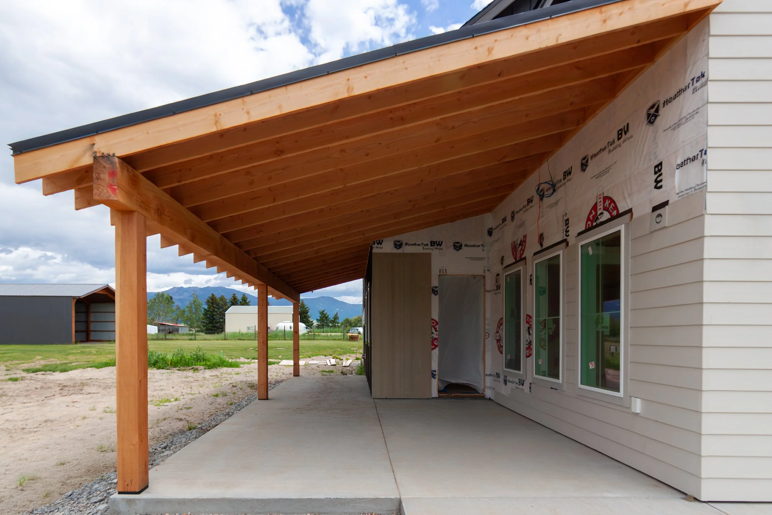 A 2-story, 3,500-sf residence with vaulted Living Room and Upper Level Loft in addition to a Gym and Office area above the Garage just north of Bozeman.
