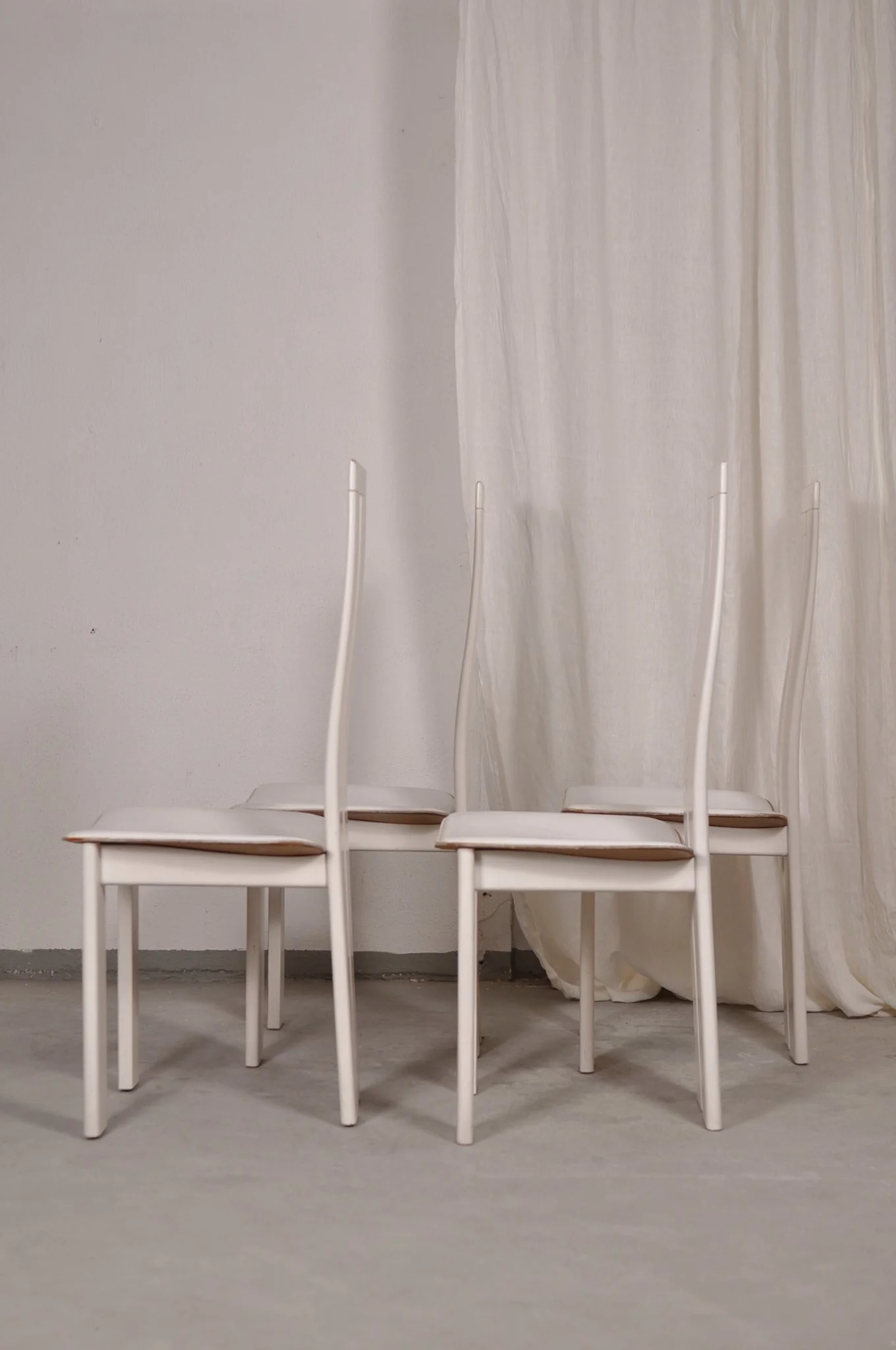 four Pietro Costantini dining chairs