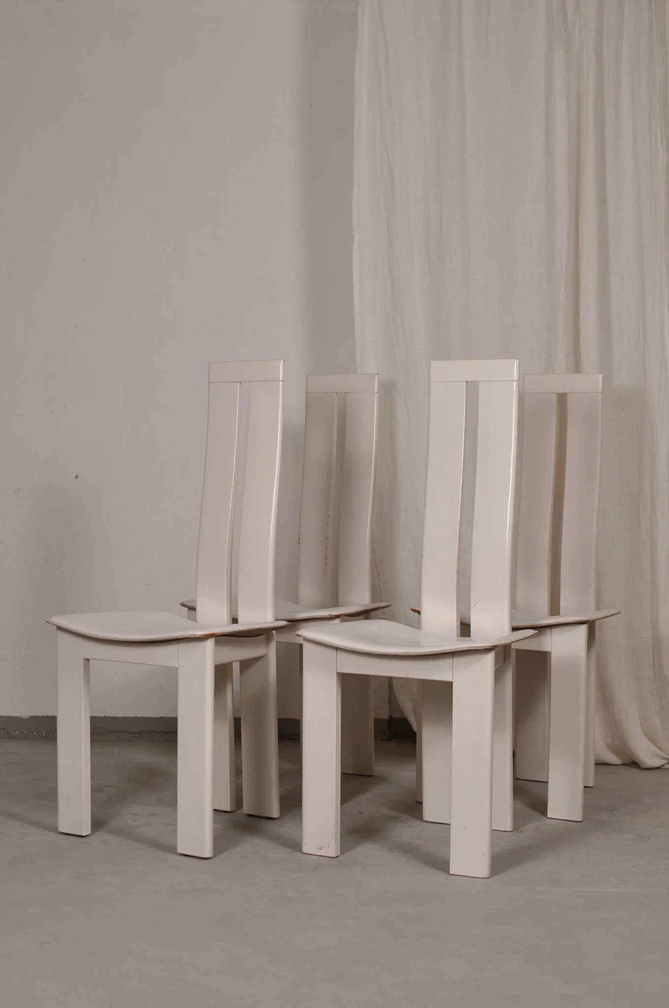 four Pietro Costantini dining chairs