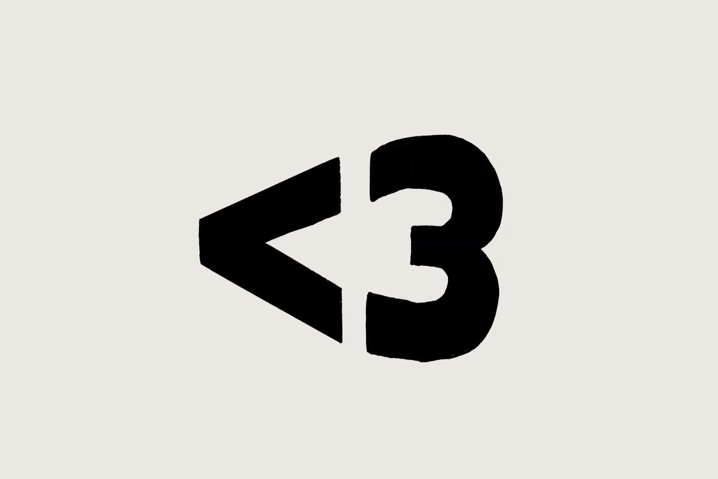 black block letter heart made from < and 3