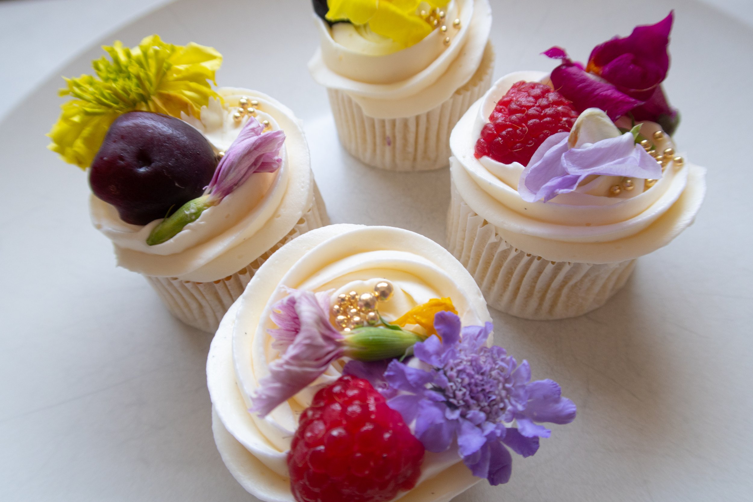 Hand-decorated custom cupcakes with premium buttercream toppings