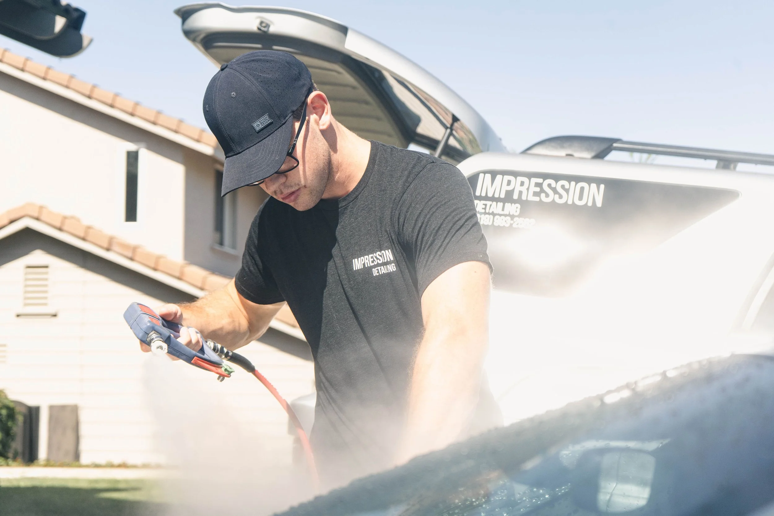 Mobile detailing in San Marcos — freshly detailed car in a North County driveway