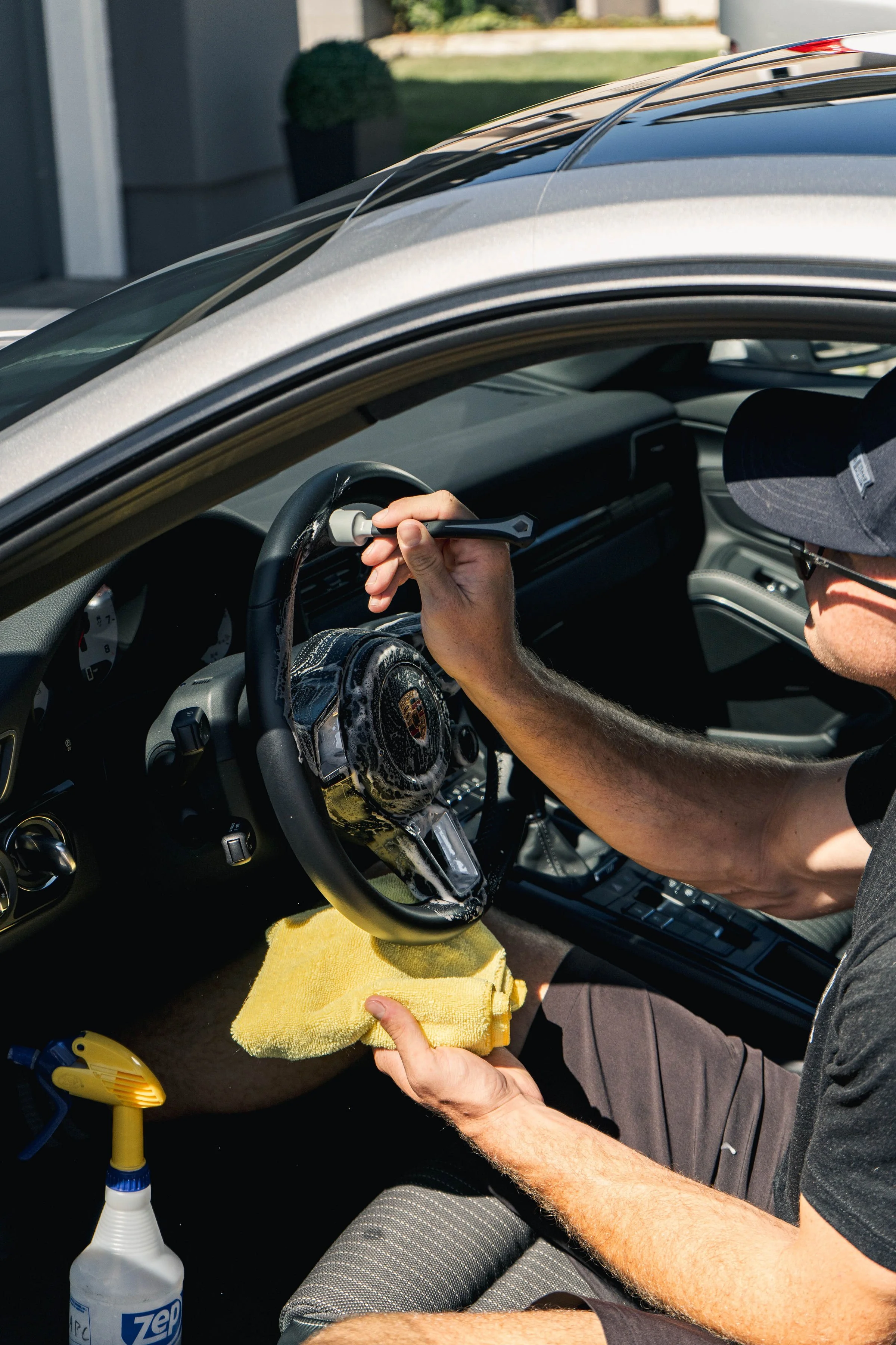 Interior car detailing with microfiber and detail spray - Impression Detailing, San Marcos CA