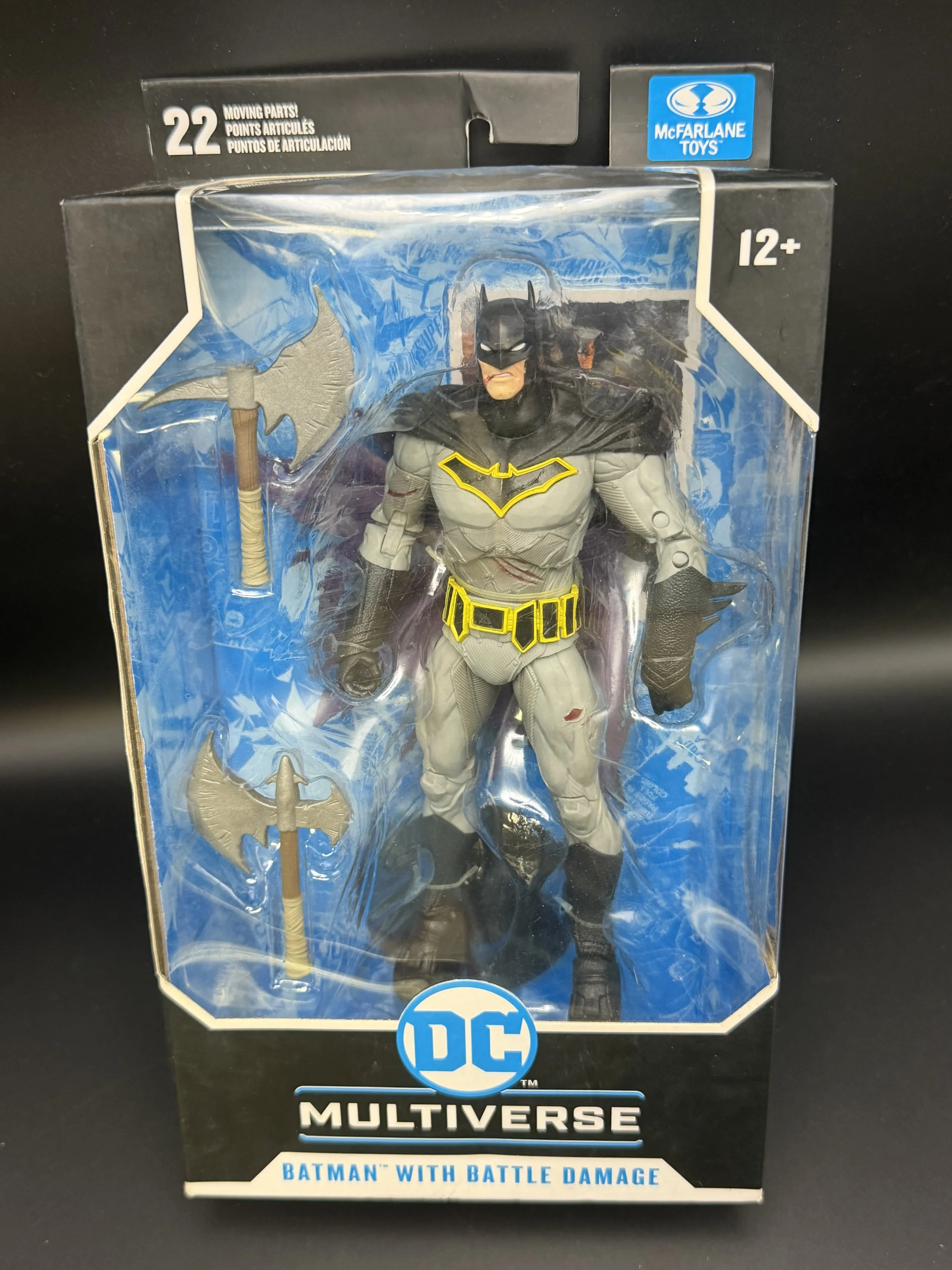 McFarlane Toys DC Multiverse Batman with Battle Damage – Gray Costume and Yellow Bat Emblem — DC Multiverse Action Figure