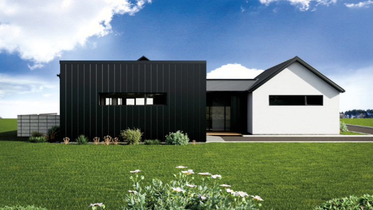 Modern house with black and white exterior, well-manicured lawn, and clear blue sky.