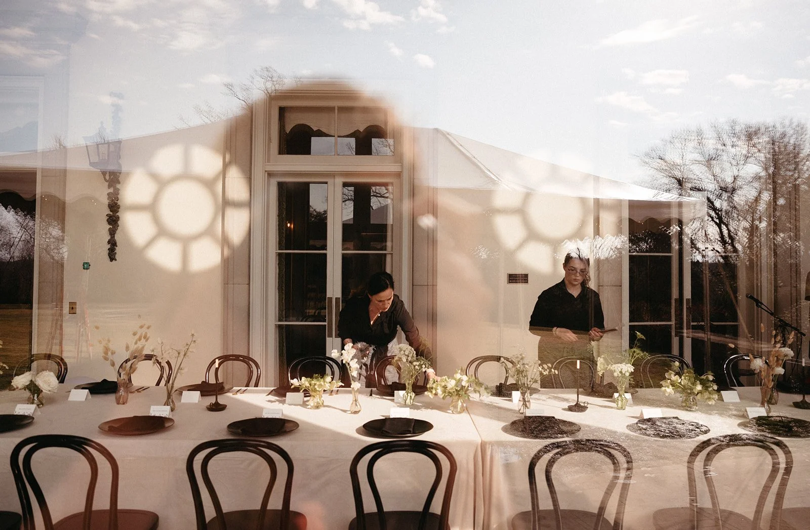 Our team preparing for an intimate wedding with a perfectly set table, ready to welcome your guests