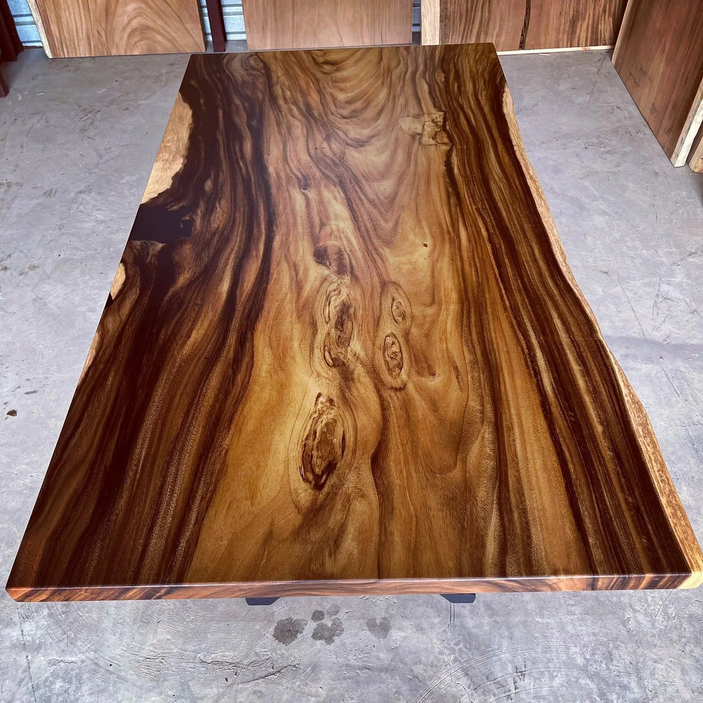 Beautiful grain patterns on this 6ft modern live edge dining table with black epoxy inlays. I&rsquo;ve recently started incorporating straight cuts on certain live edge pieces with keeping some live edge on certain sections of the table top.  Let me 