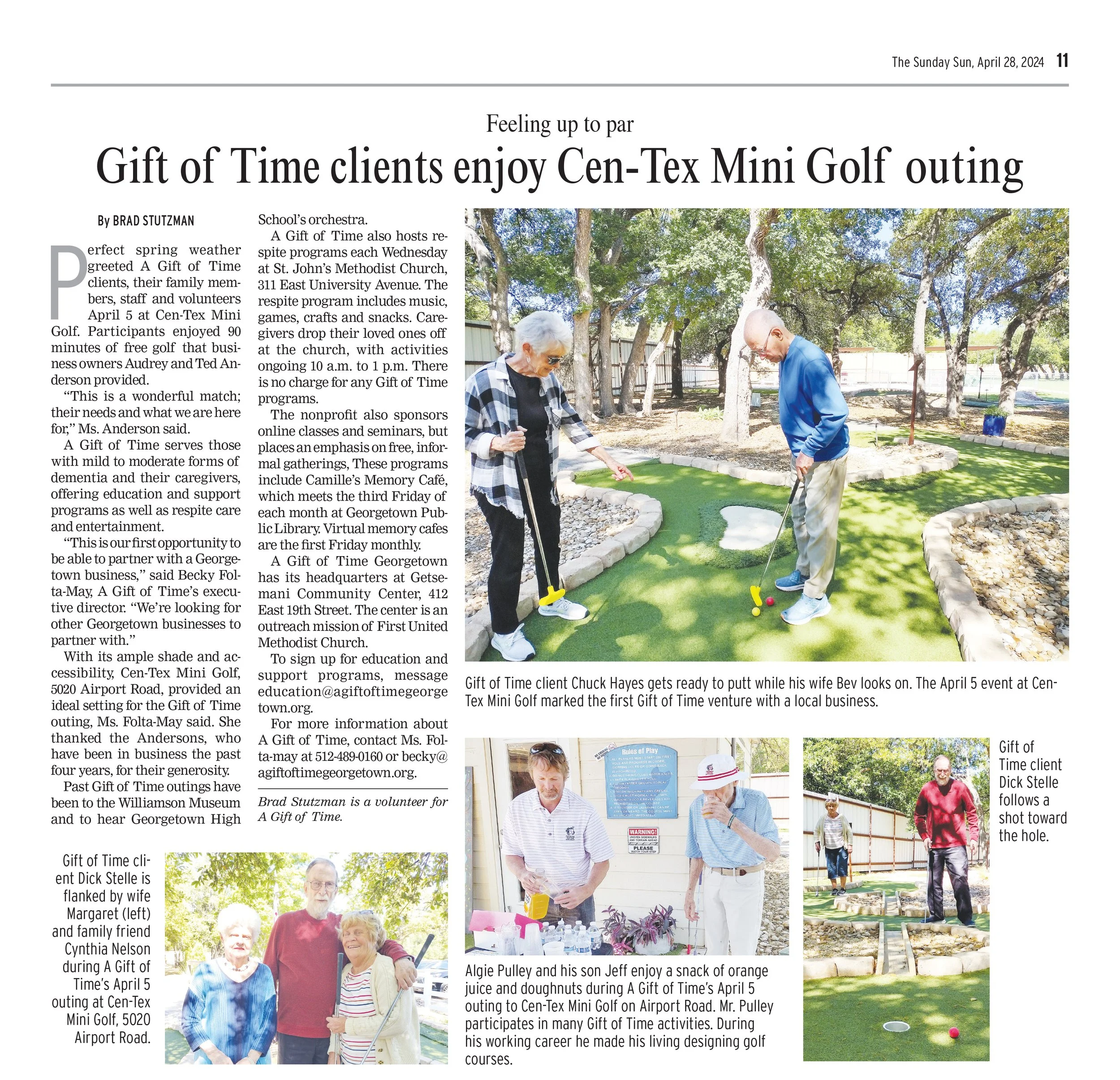 Two elderly men playing mini golf outdoors in a garden setting, one yellow ball and two pink golf balls visible, trees and a fence in the background.