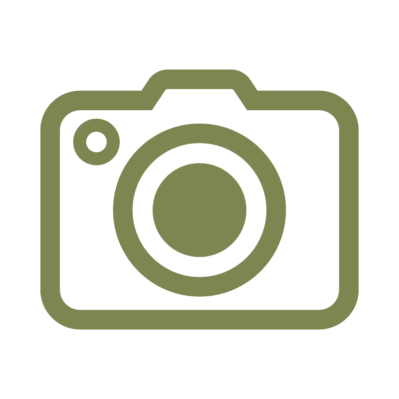 Icon of a digital camera in olive green with a large lens, on a black background.