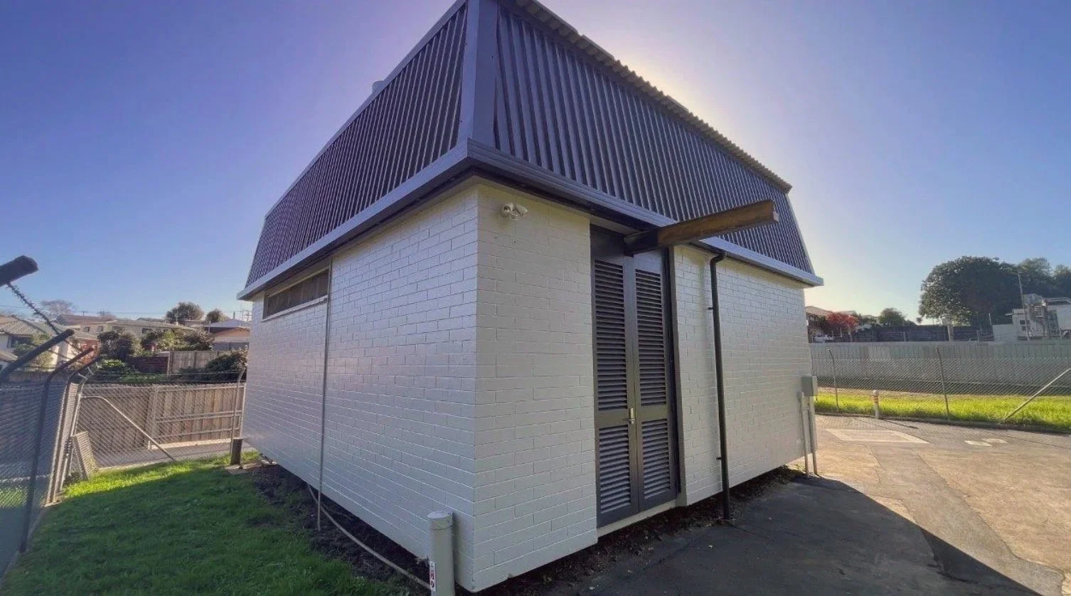 Exterior of commercial building after repaint, painted block walls, Tauranga