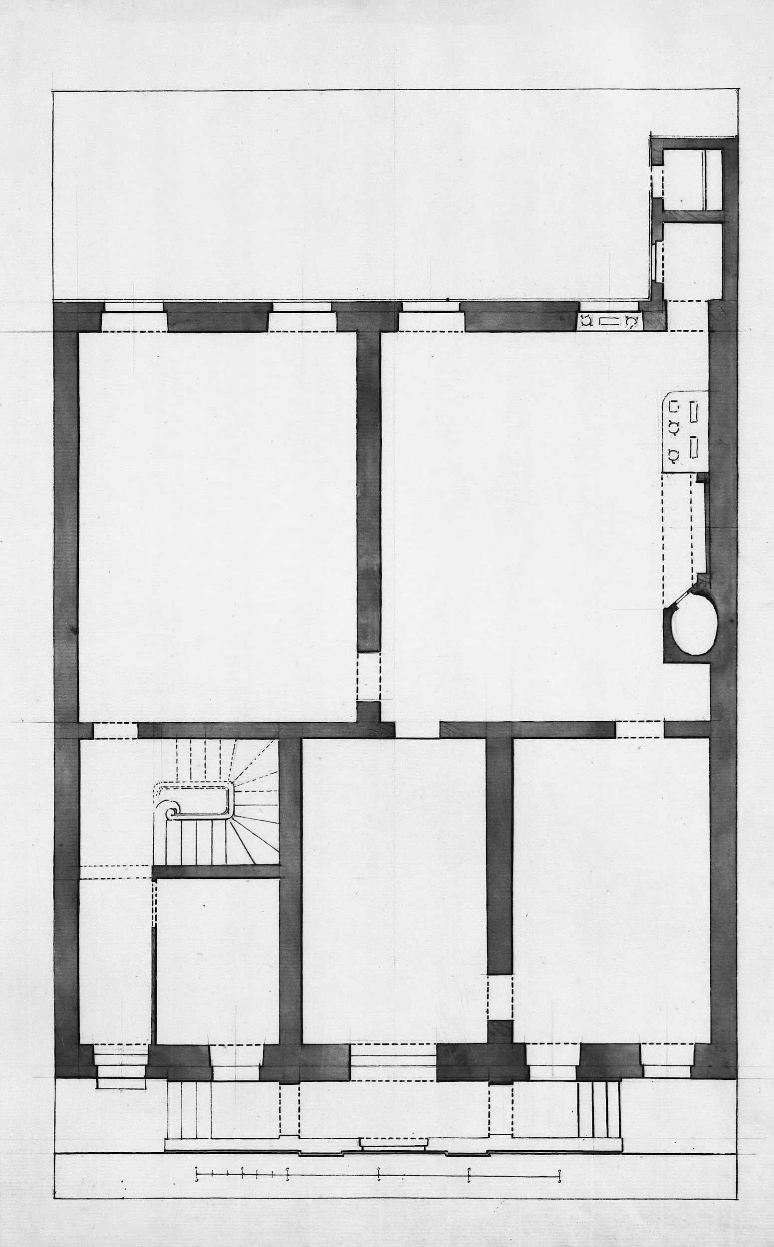 Architectural blueprint of a building's floor plan showing rooms, walls, stairs, and fixtures.