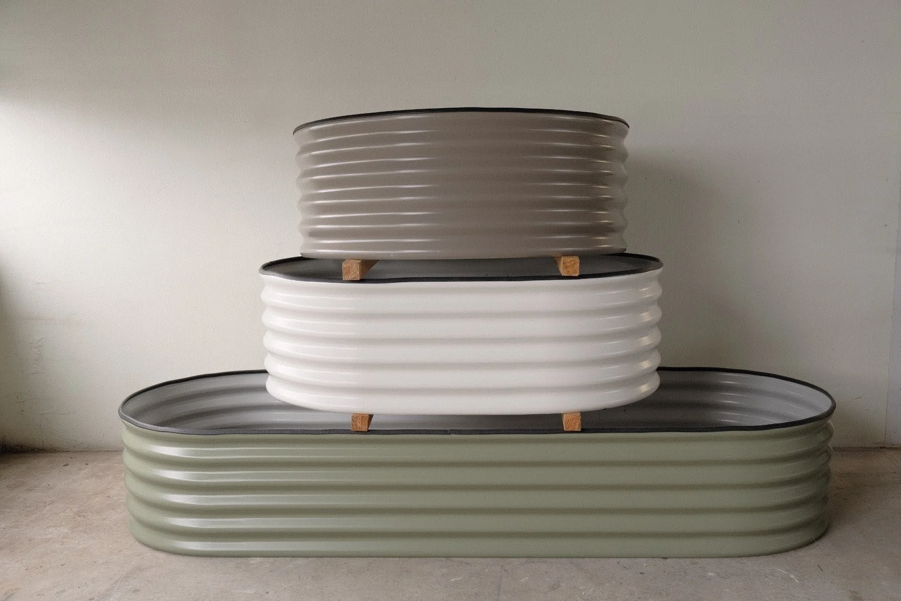 Colorbond raised garden beds in surfmist Pale Eucalypt and brown stacked on top of each other. Built to the last, made to last in Perth WA