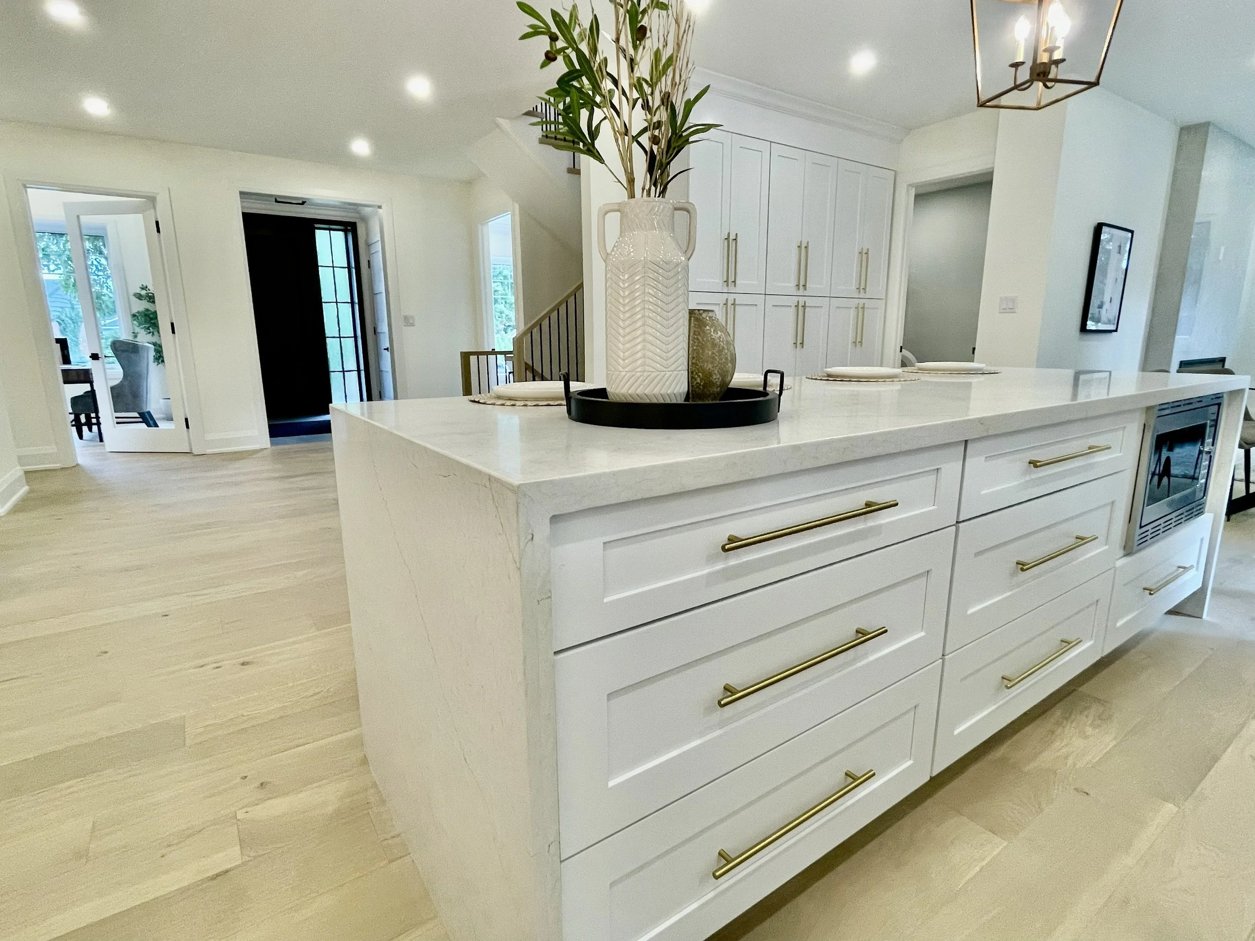 Modern main floor renovation in Burlington with custom cabinetry, white oak floors 