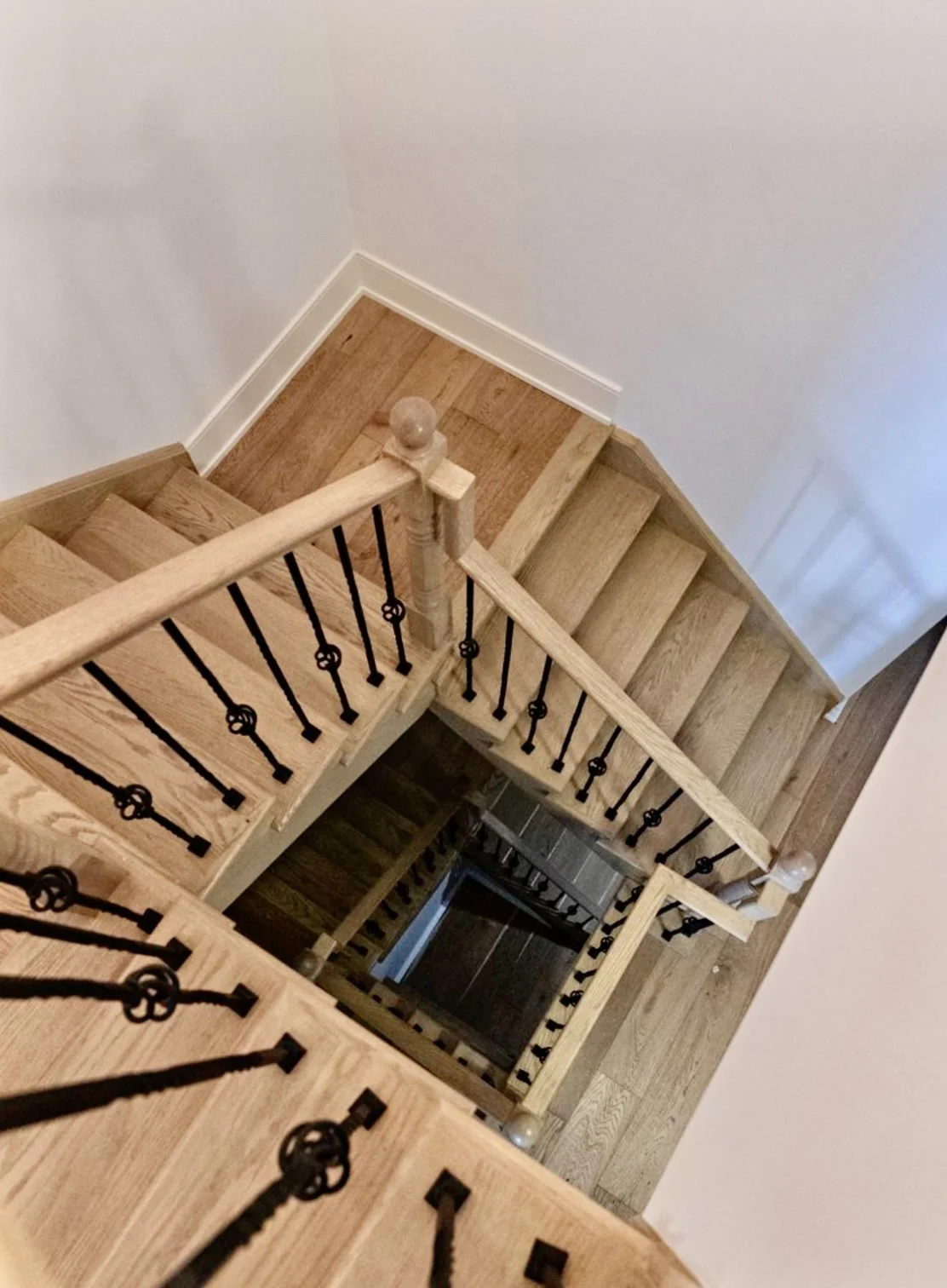 multi level wooden and metal stairs in Mississauga townhouse
