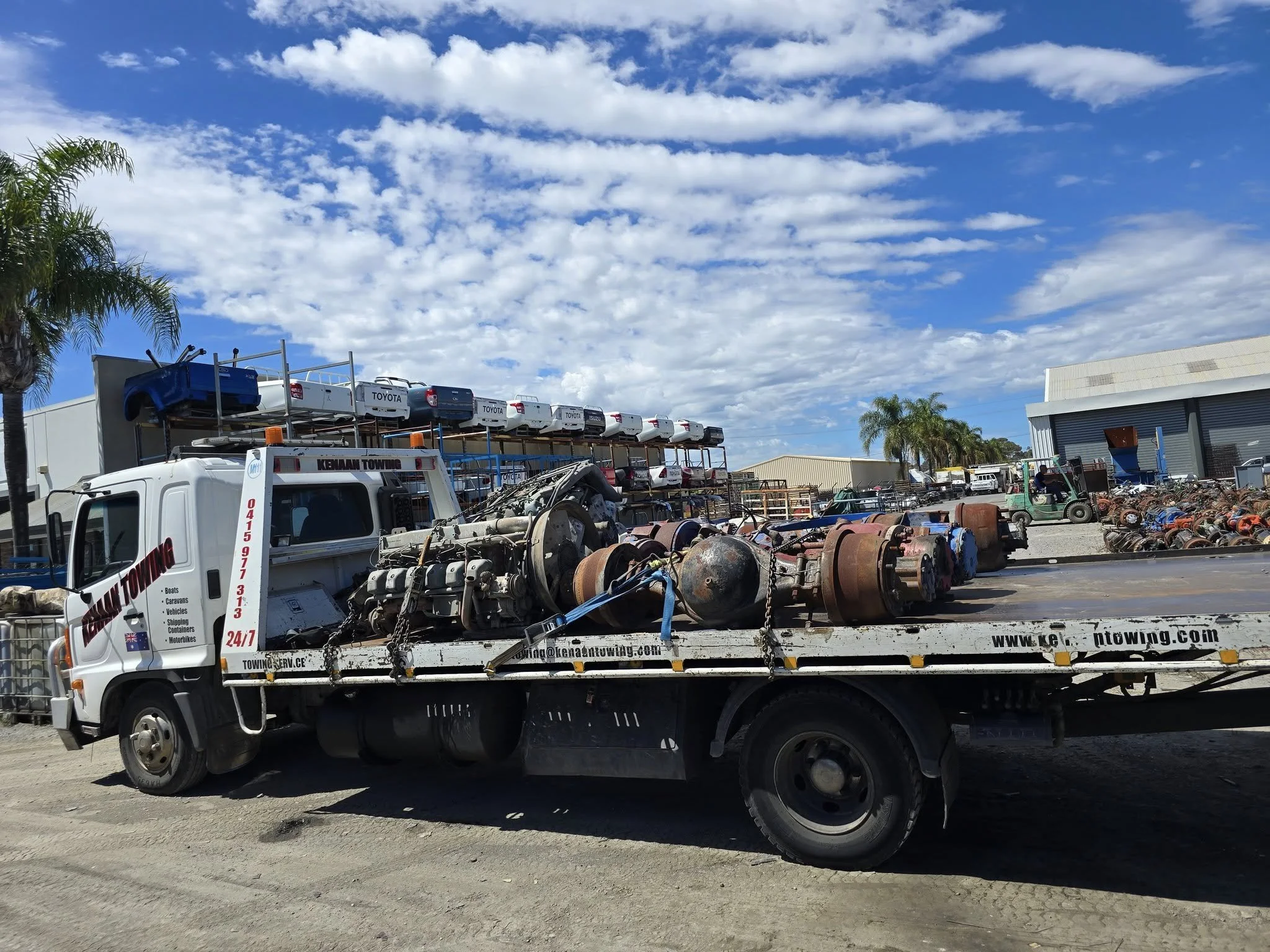 Kenaan Towing, Adelaide, A flatbed tow truck transporting, car parts
