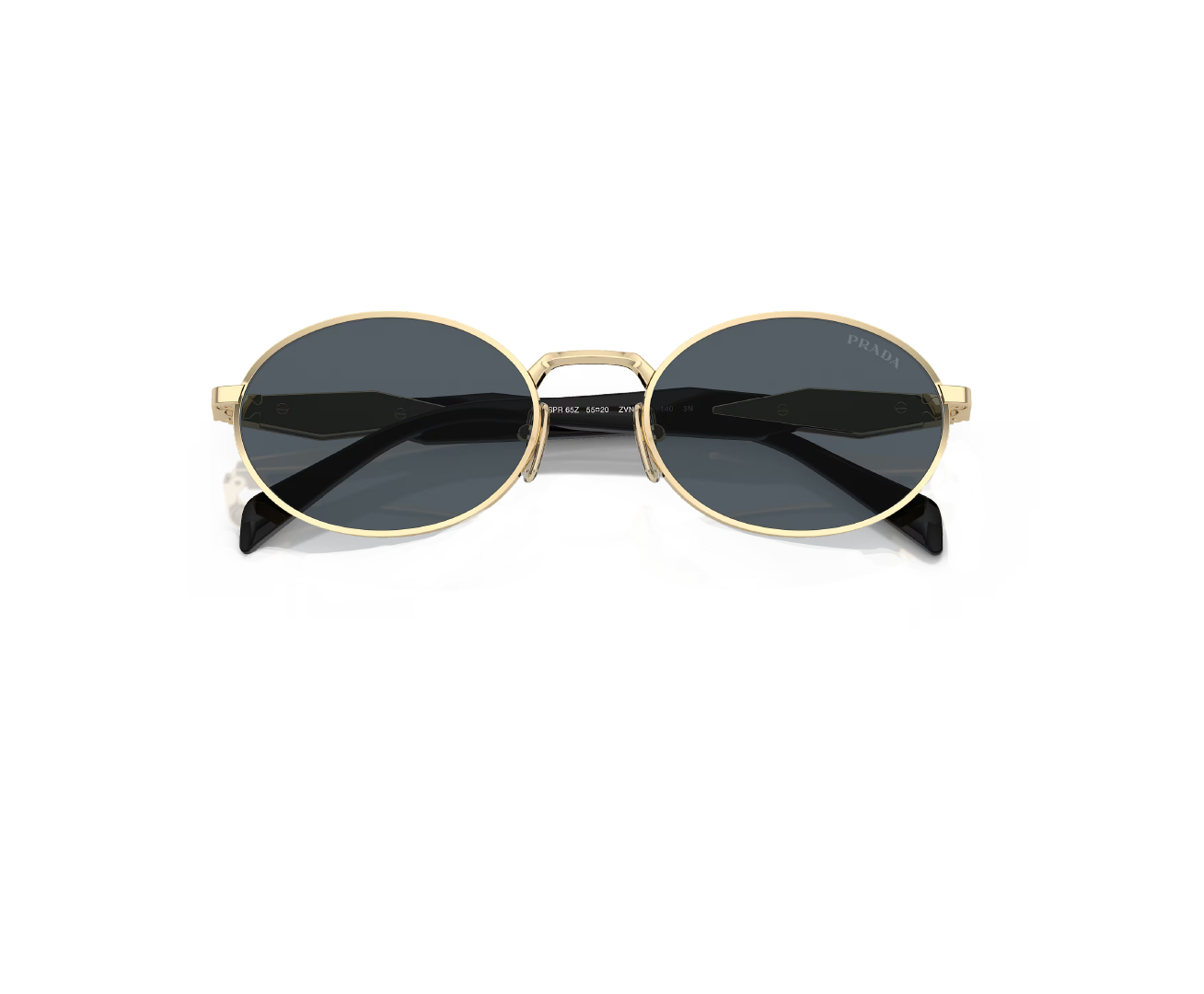 Gold sunglasses with dark lenses, resting on a reflective black surface.
