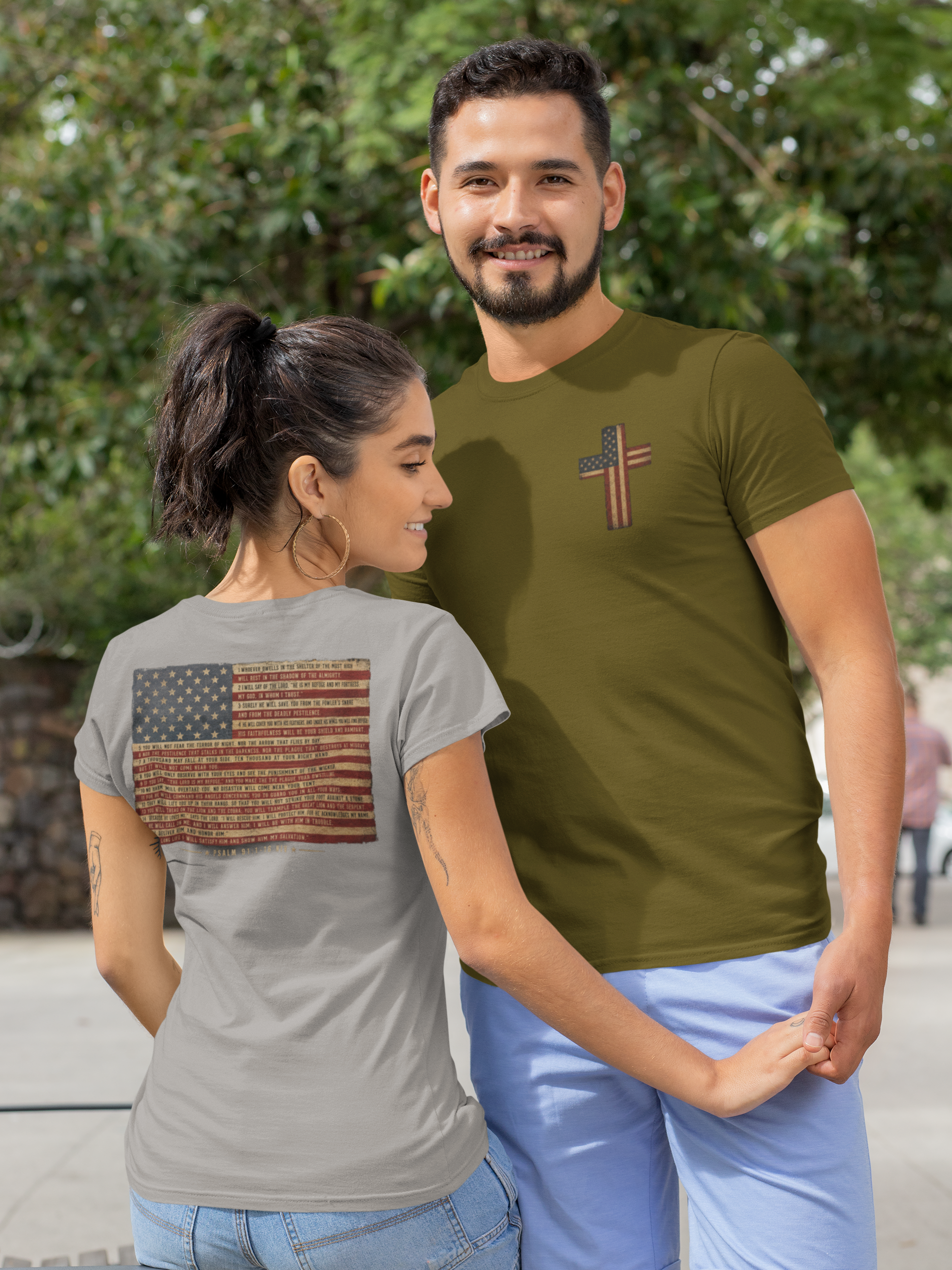 front-and-back-t-shirt-mockup-of-a-couple-holding-hands-on-the-street-29782.png