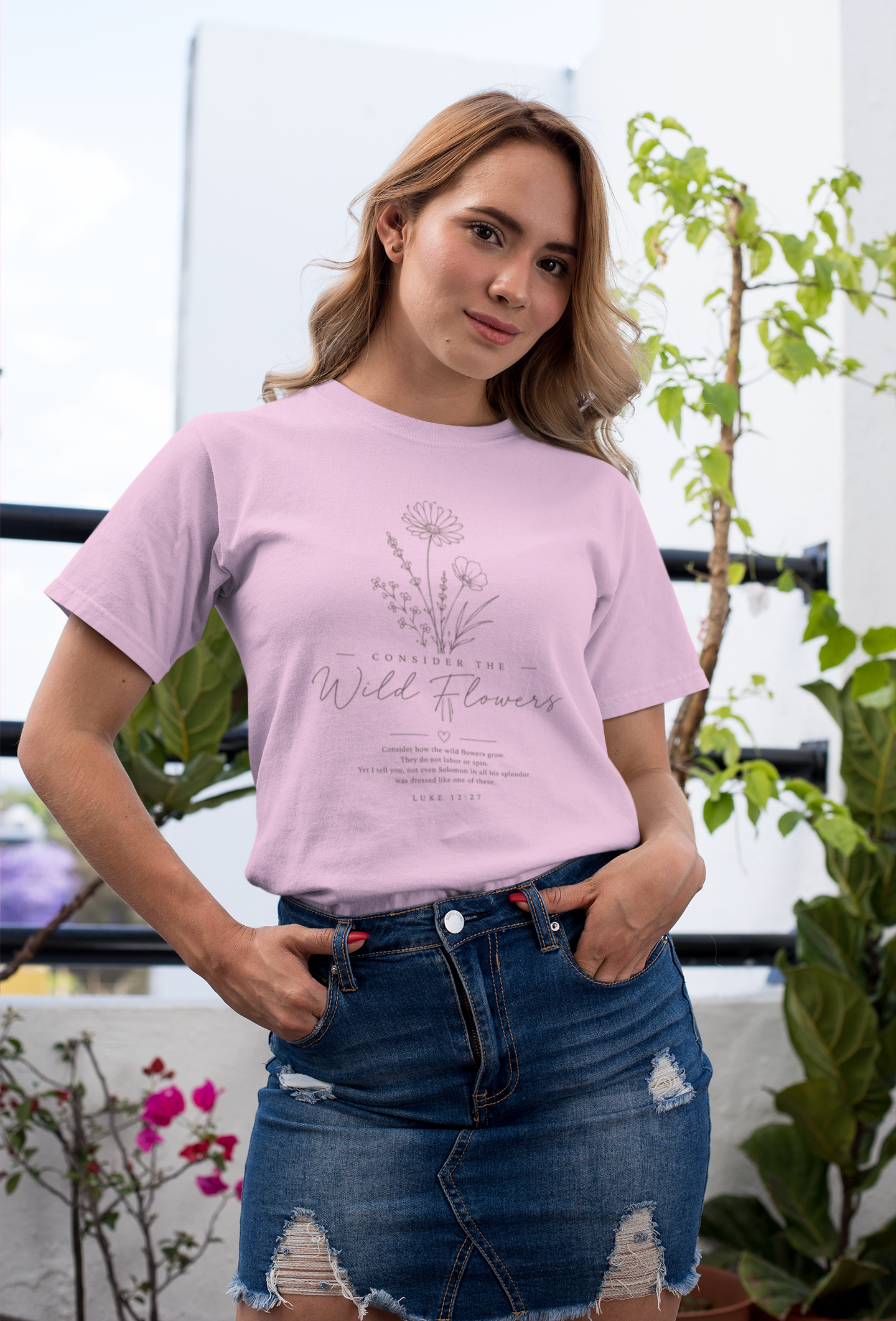 tee-mockup-of-a-girl-with-a-coy-smile-by-a-balcony-26628 (3).png